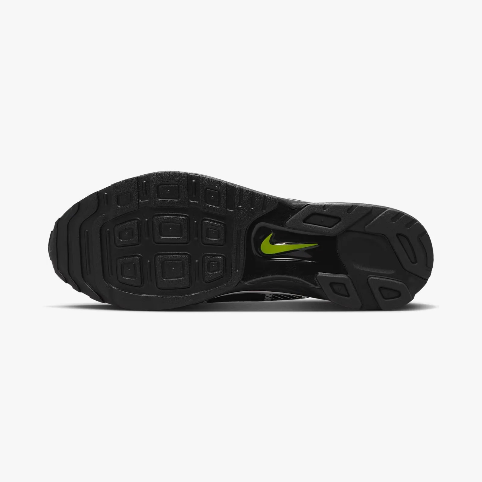 Black rubber shoe sole with textured grip and a green Nike swoosh logo in the arch area.