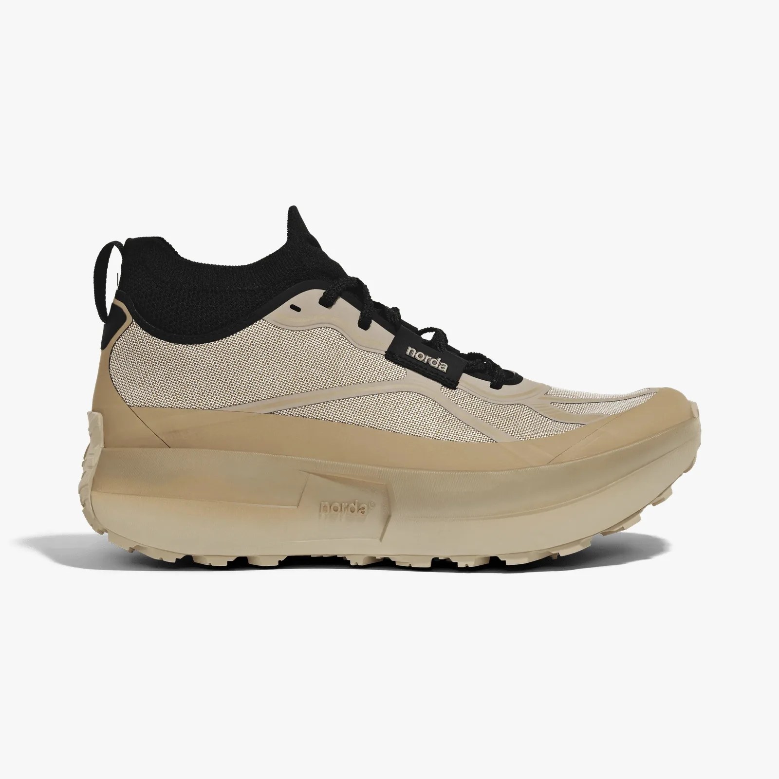 Beige and black athletic shoe with thick sole and knit ankle collar, featuring "norda" branding on side and sole.