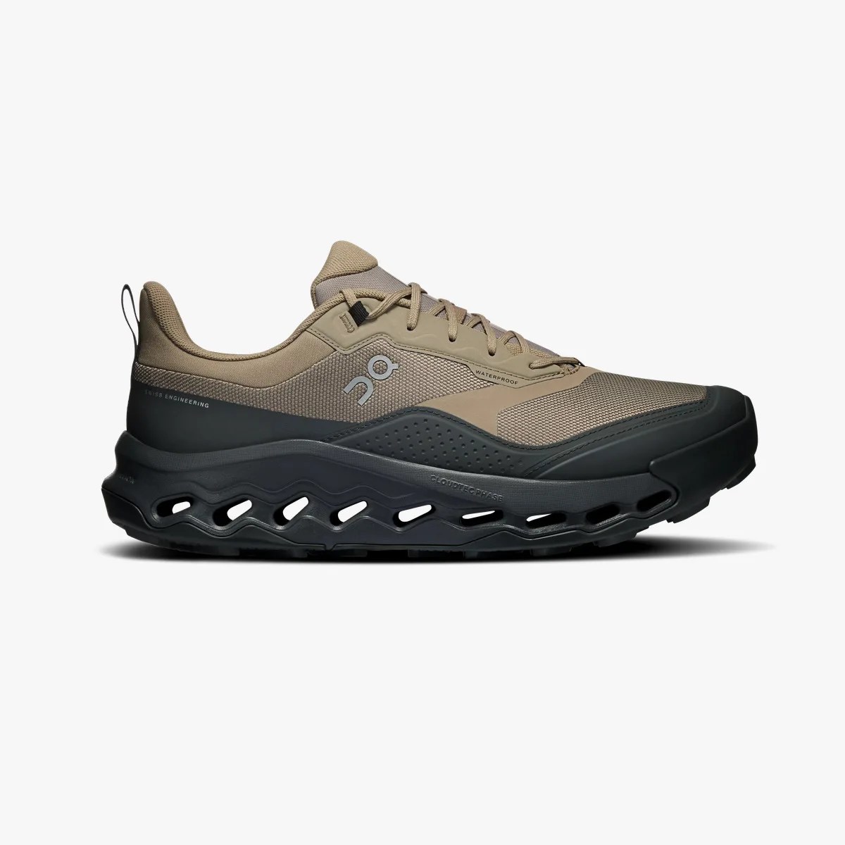 Tan and black waterproof athletic shoe with a thick, ventilated black sole and lace-up closure.
