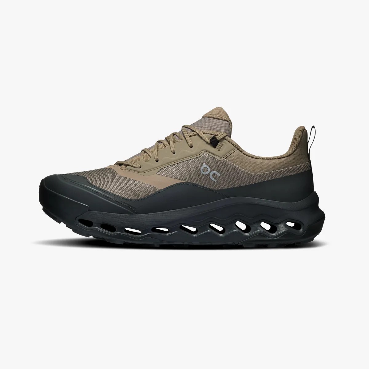 Tan and black athletic shoe with mesh upper and ventilated sole, side view.