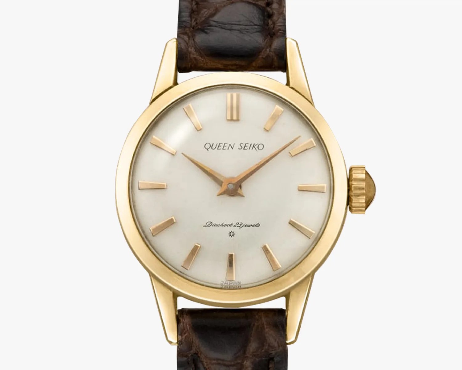 Gold round wristwatch with white dial, gold hour markers, and brown leather strap.