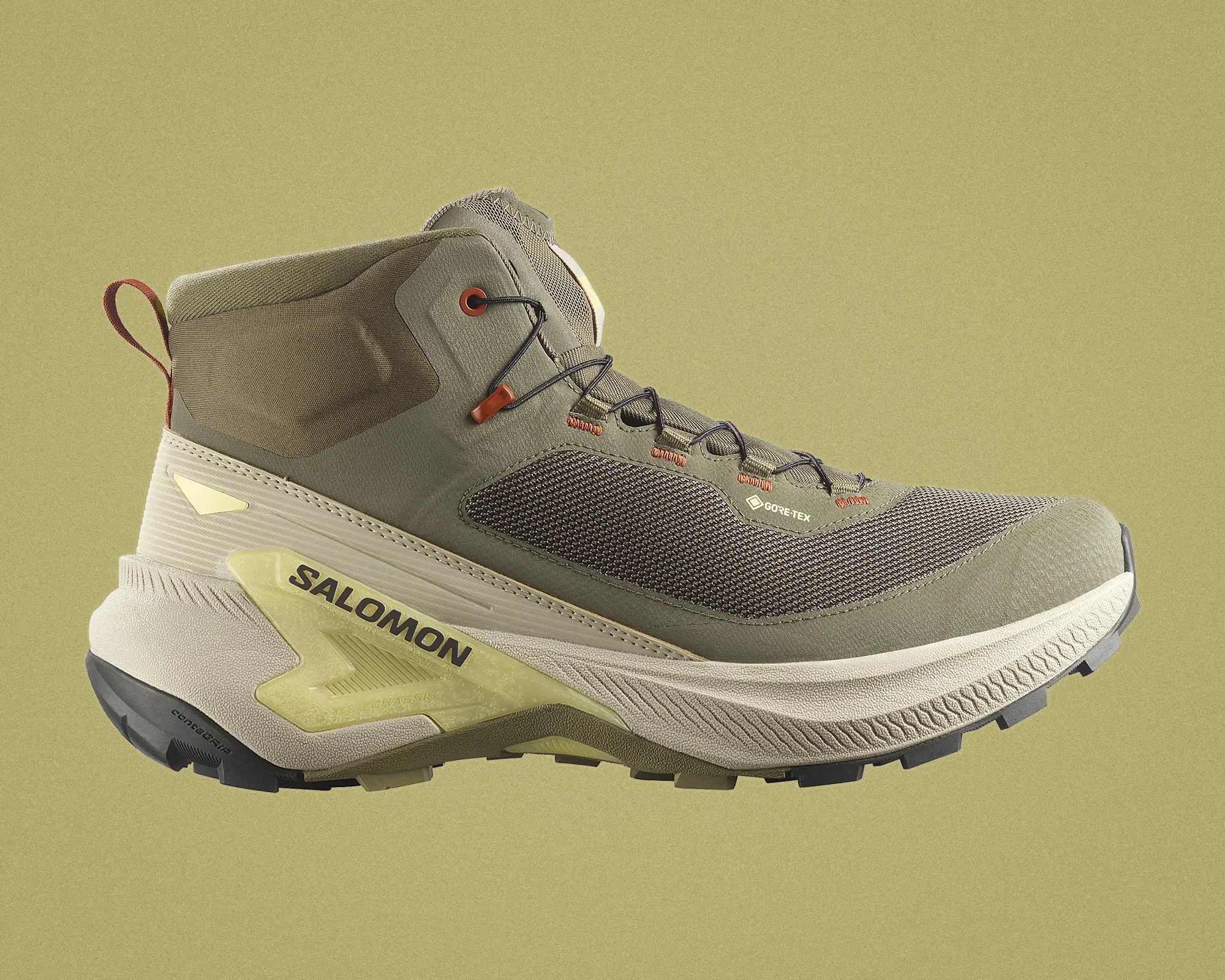 Olive green Salomon hiking shoe with Gore-Tex fabric and beige sole on a plain background.