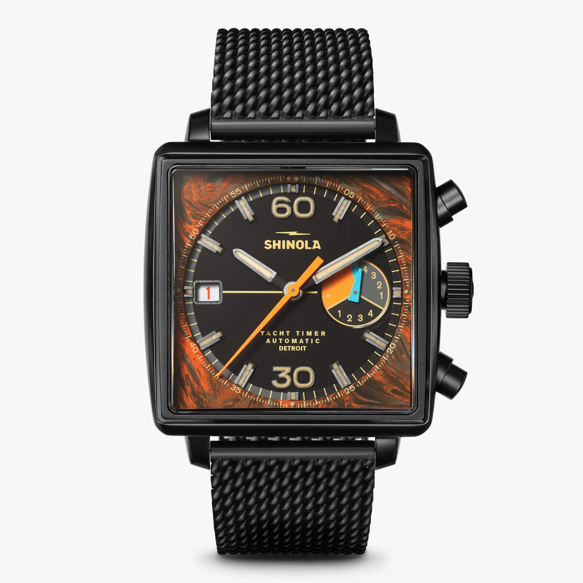 Square black Shinola watch with orange and blue accents and a black textured strap.