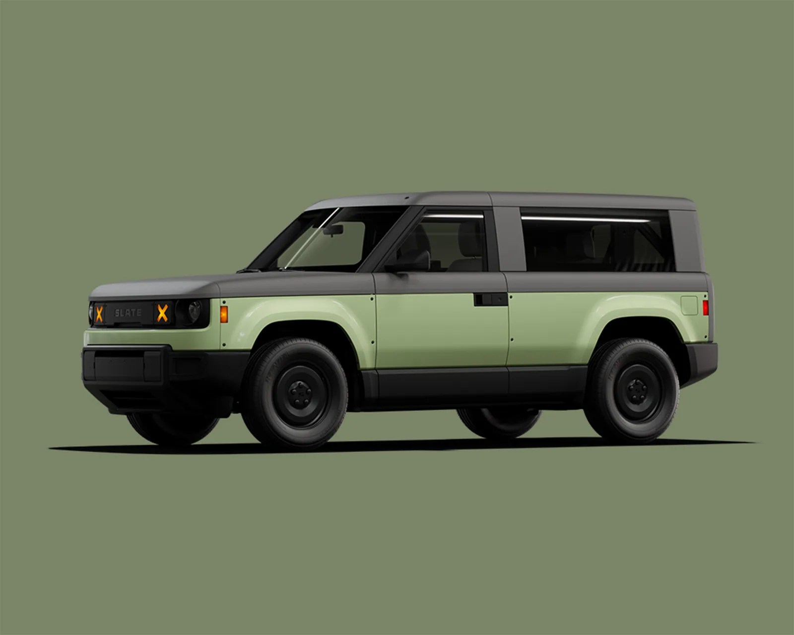 Boxy two-tone green and gray SUV with black wheels on a green background.