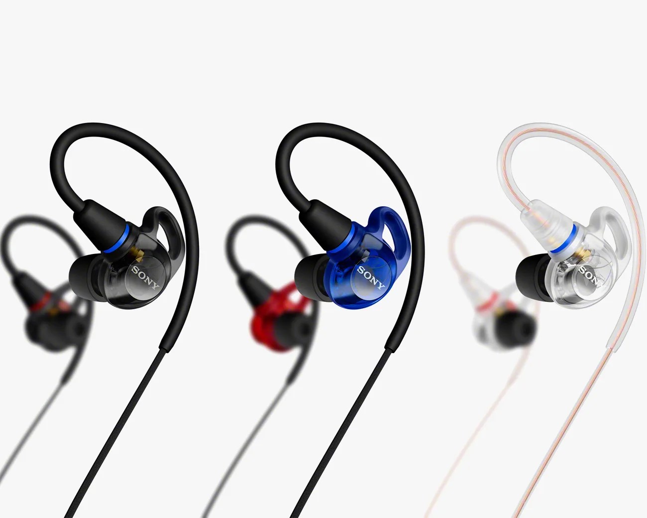 Three pairs of Sony in-ear monitor headphones with ear hooks in black, blue, and clear colors.