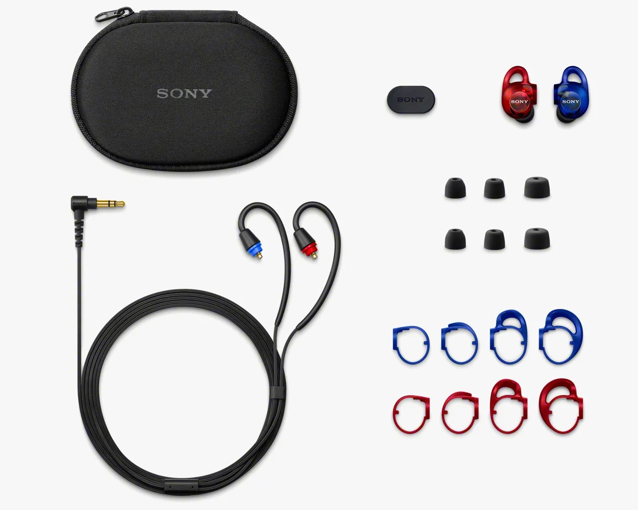 Sony black carrying case, wired earphones with red and blue connectors, red and blue wireless earbuds, multiple black ear tips, and red and blue ear hooks.