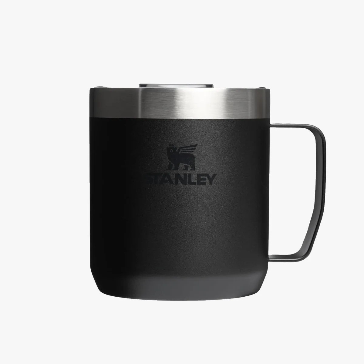 Matte black Stanley insulated mug with stainless steel rim and handle on a white background.