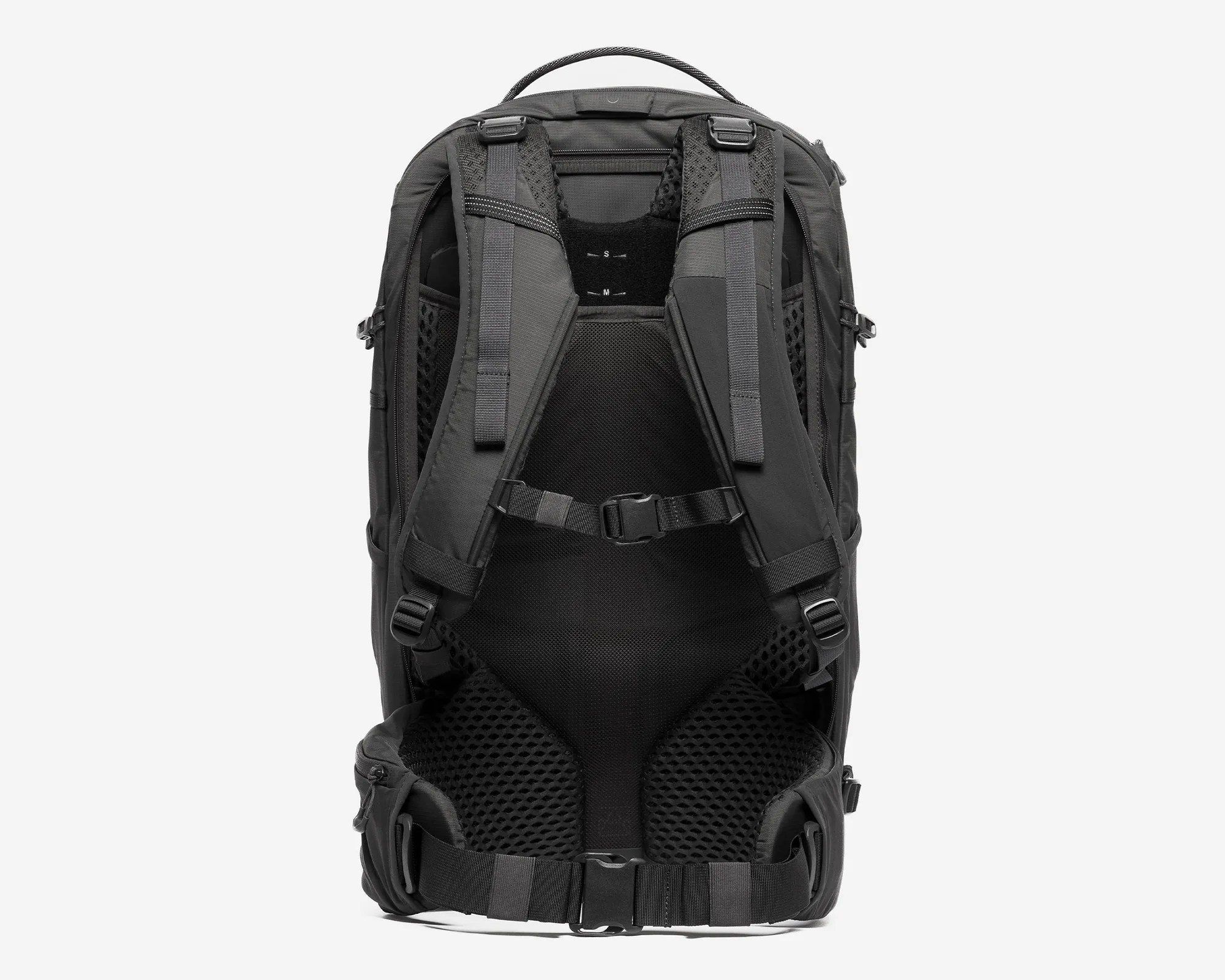 Black backpack with padded mesh back panel, adjustable shoulder straps, and waist belt with buckle.