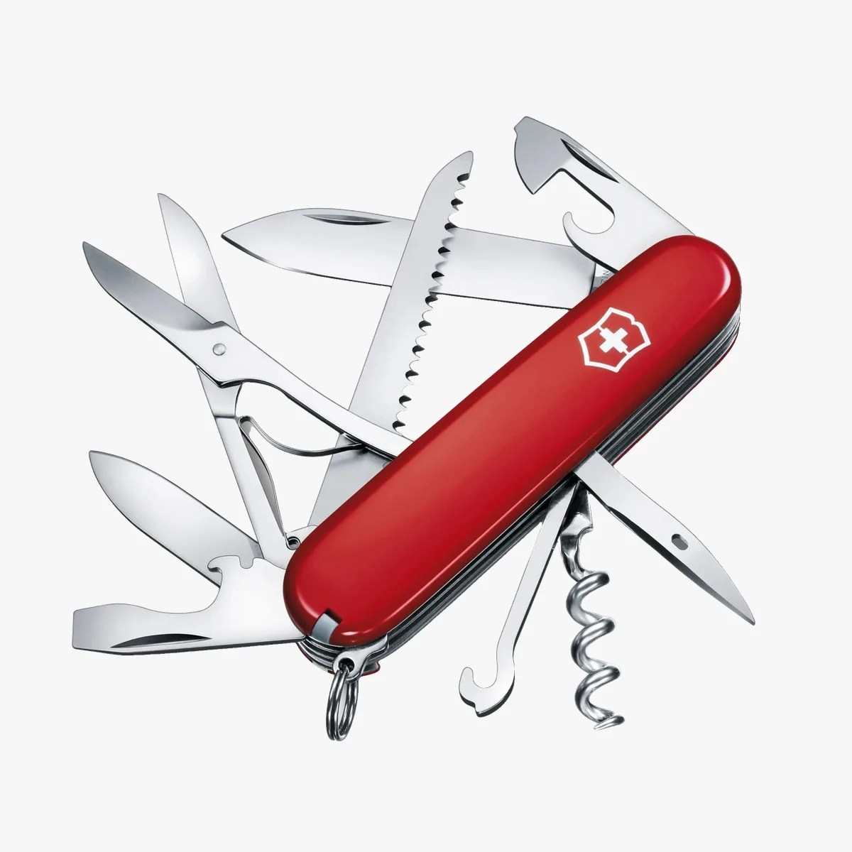 Red Swiss Army knife with multiple tools extended, including scissors, saw, knife blades, corkscrew, and bottle opener.