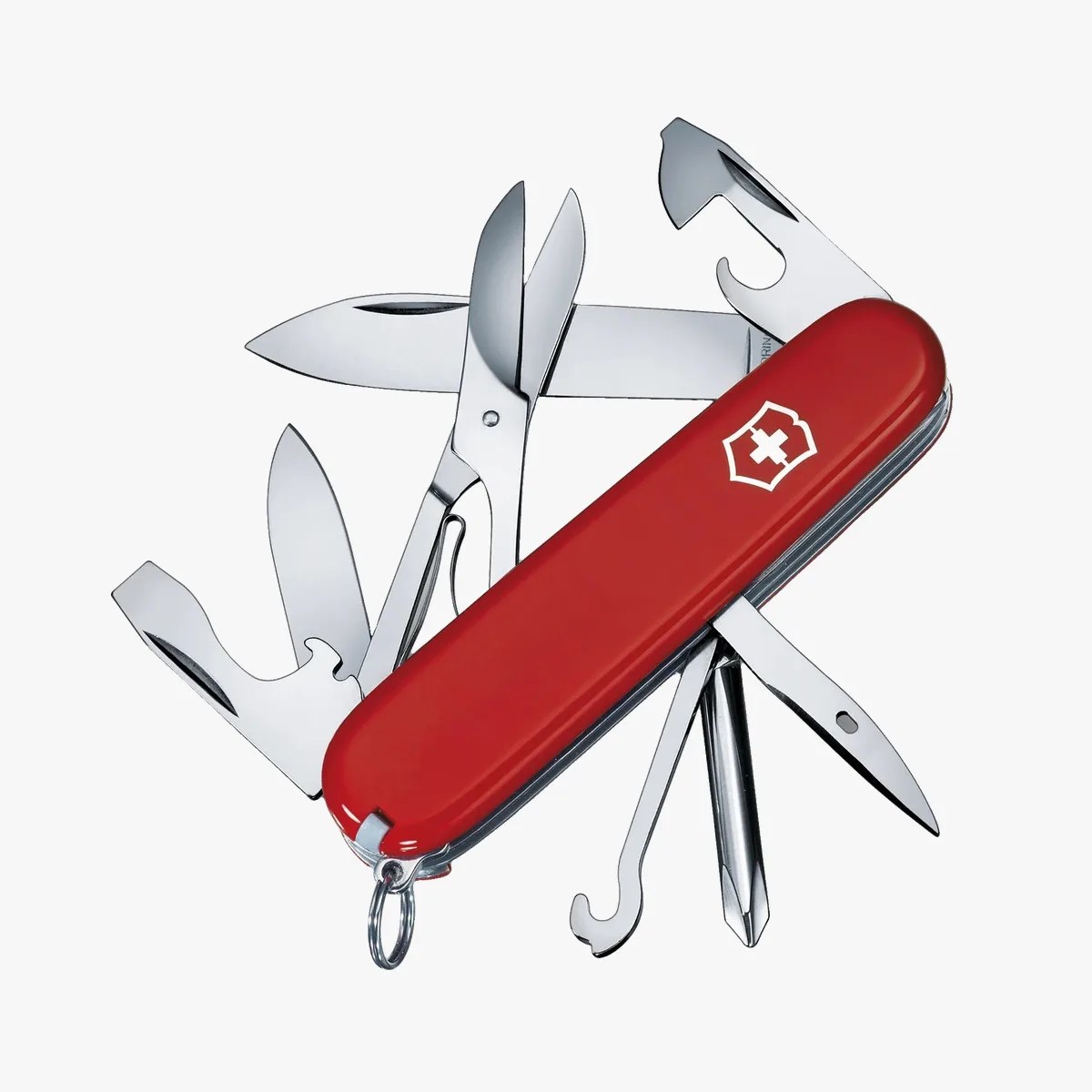 Red Swiss Army knife with multiple tools extended, including scissors, blades, and a screwdriver.