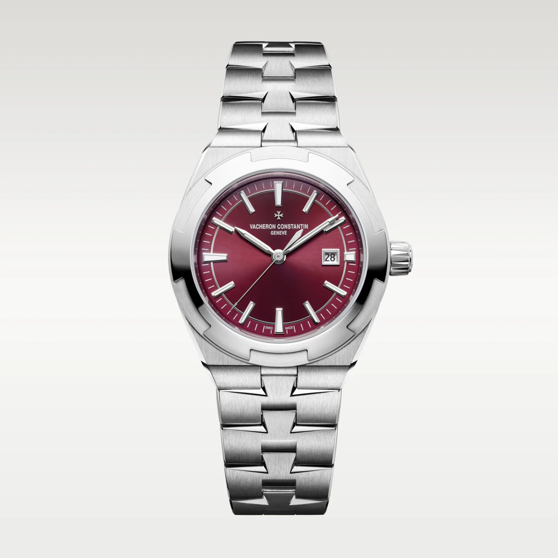 Stainless steel wristwatch with a burgundy dial, silver hour markers, date window, and a linked bracelet.