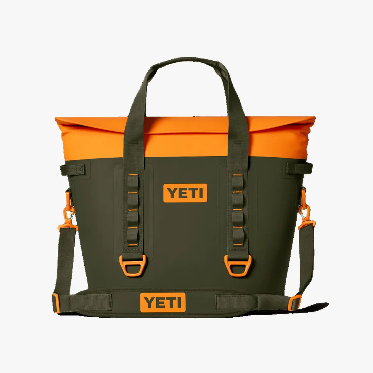 Olive green and bright orange YETI soft cooler bag with dual handles and adjustable shoulder strap.
