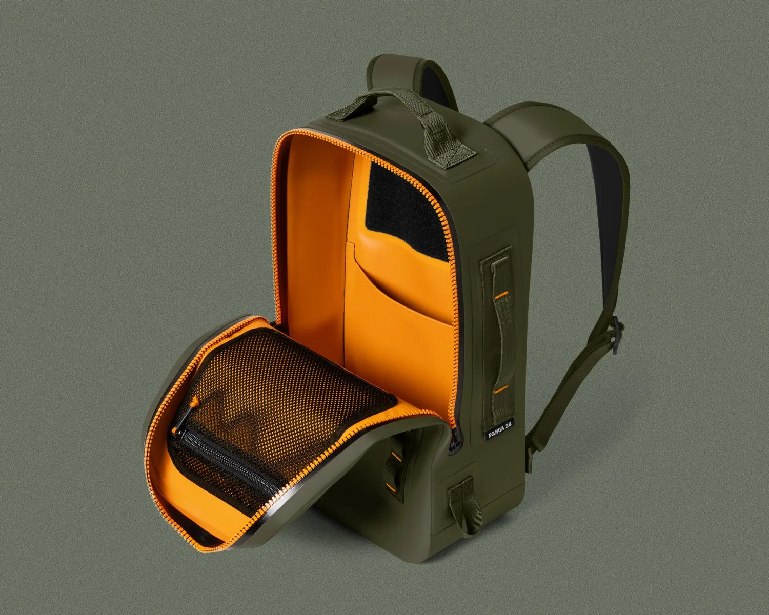 Olive green backpack with bright orange interior and mesh zippered pocket, shown open.