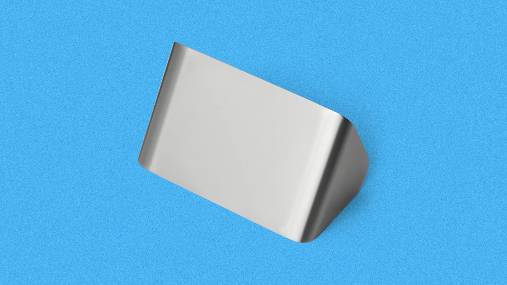 Silver metal money clip on a blue textured background.