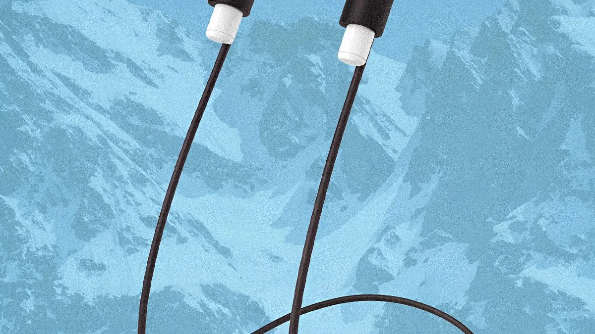Black wired earphones with white earbuds against a blue textured background.