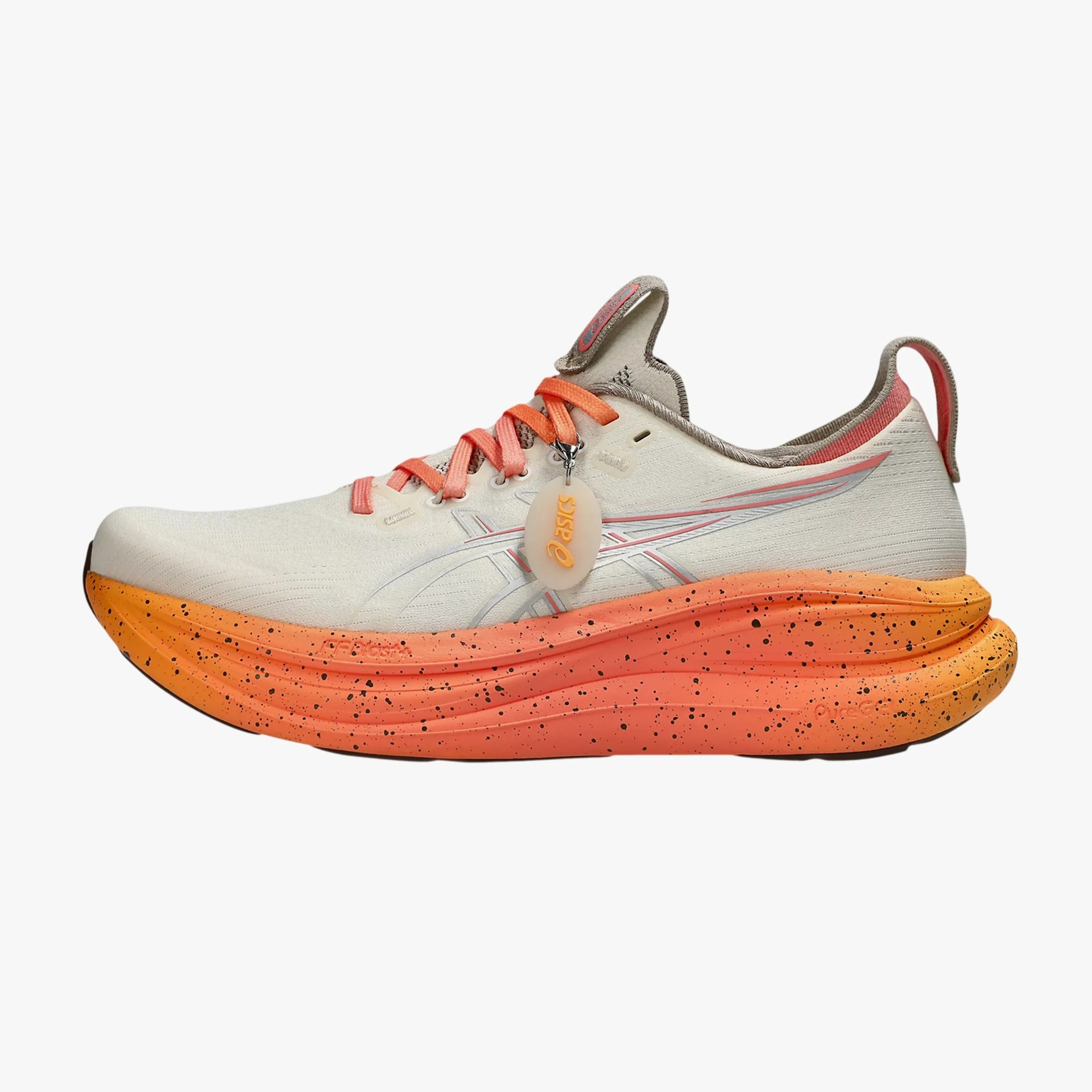 Off-white ASICS running shoe with orange laces and speckled orange sole.