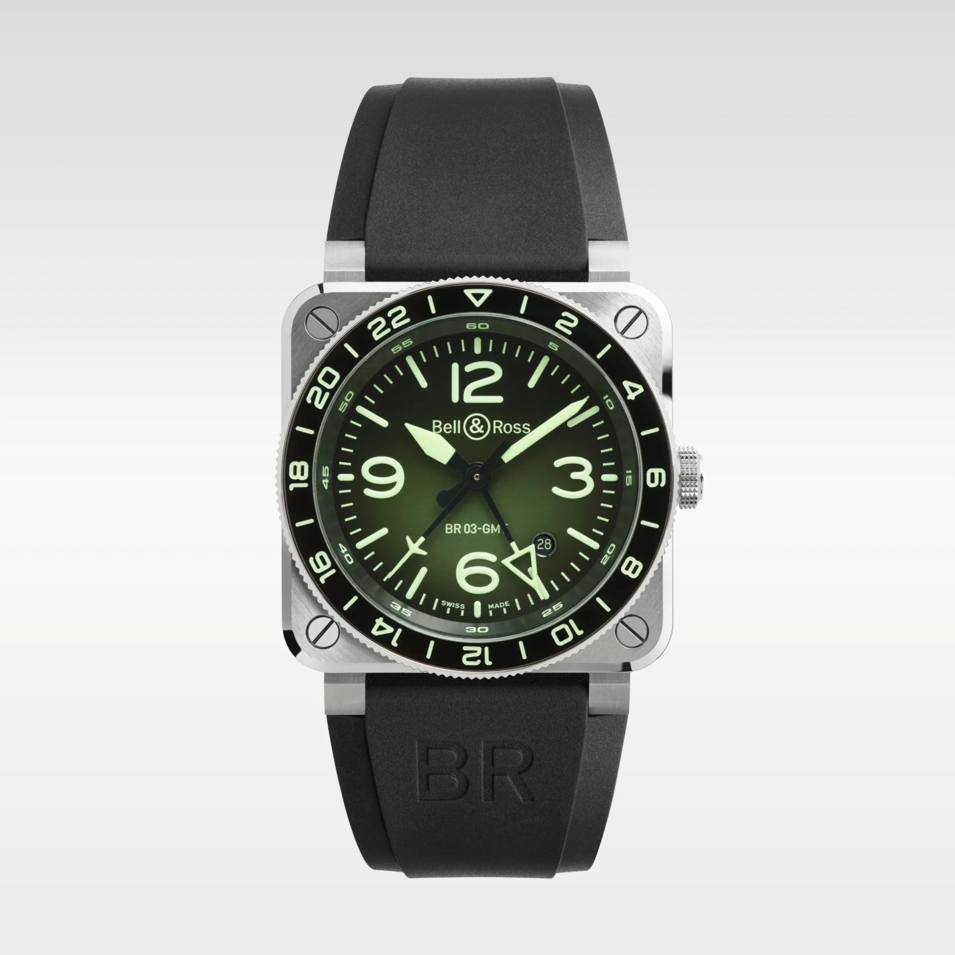 Square stainless steel Bell & Ross BR 03-92 wristwatch with green dial and black rubber strap.