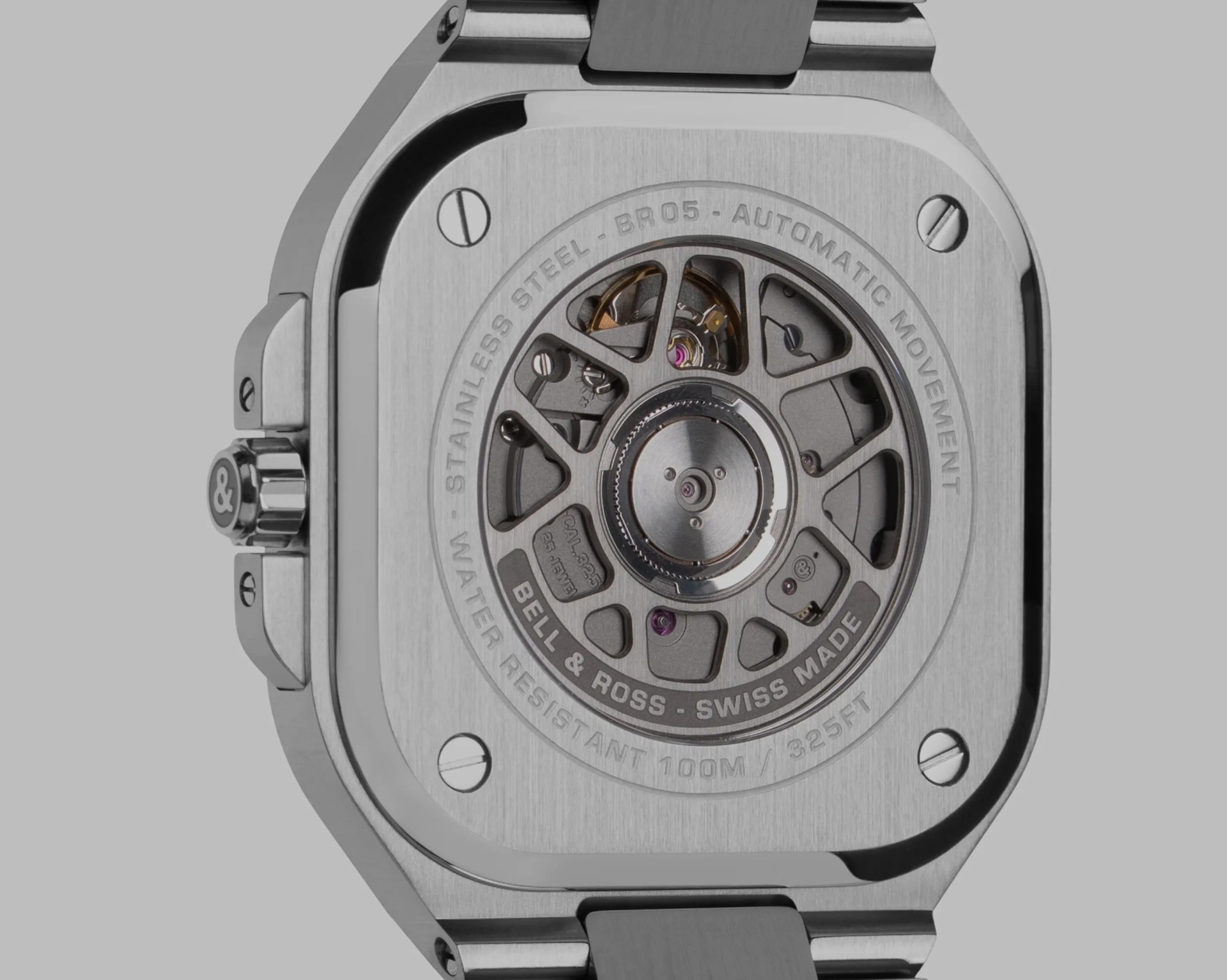 Close-up of the stainless steel Bell & Ross watch back showing the automatic movement and water resistance details.