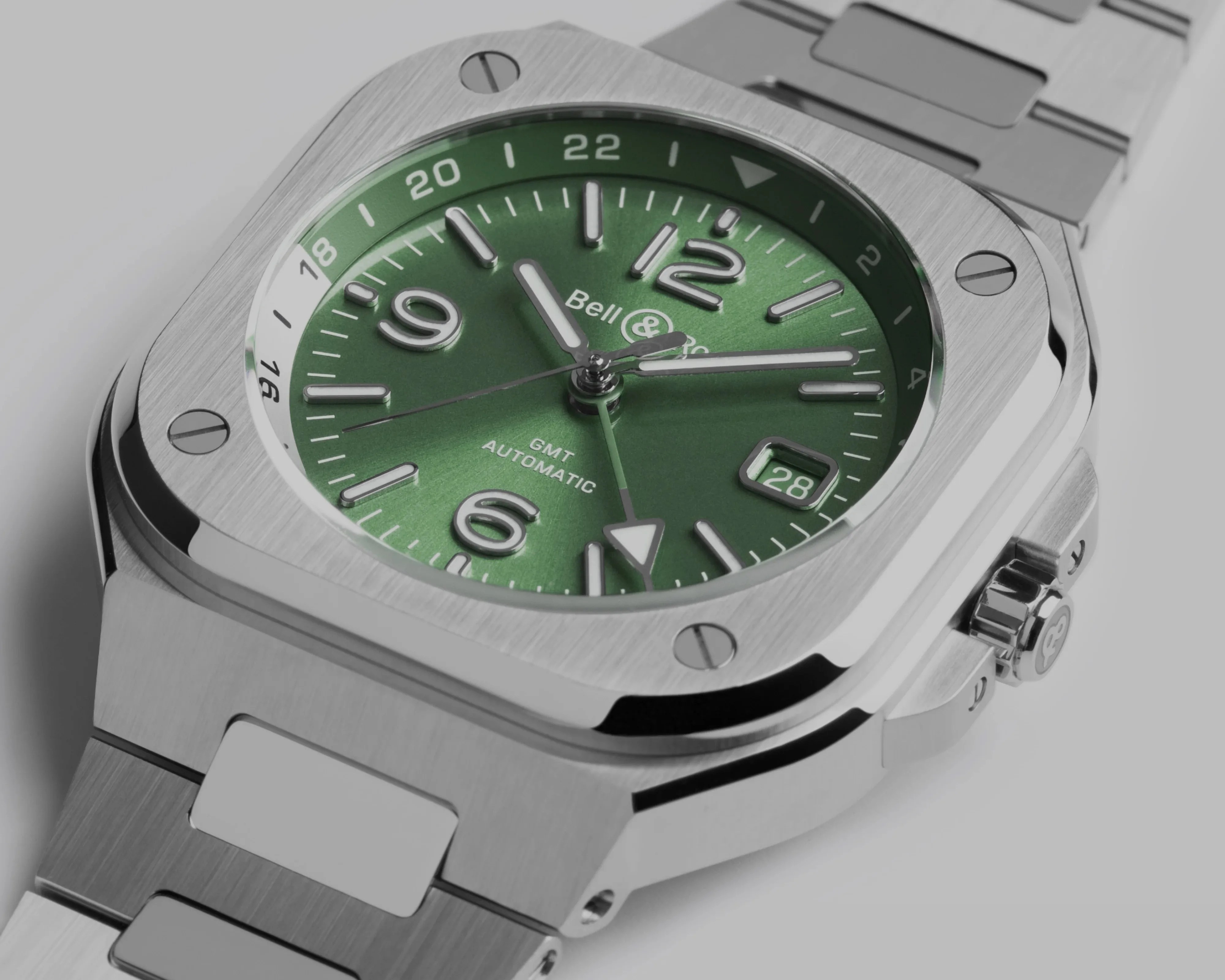 Stainless steel Bell & Ross wristwatch with green dial, silver hour markers, and date window at 4 o'clock.