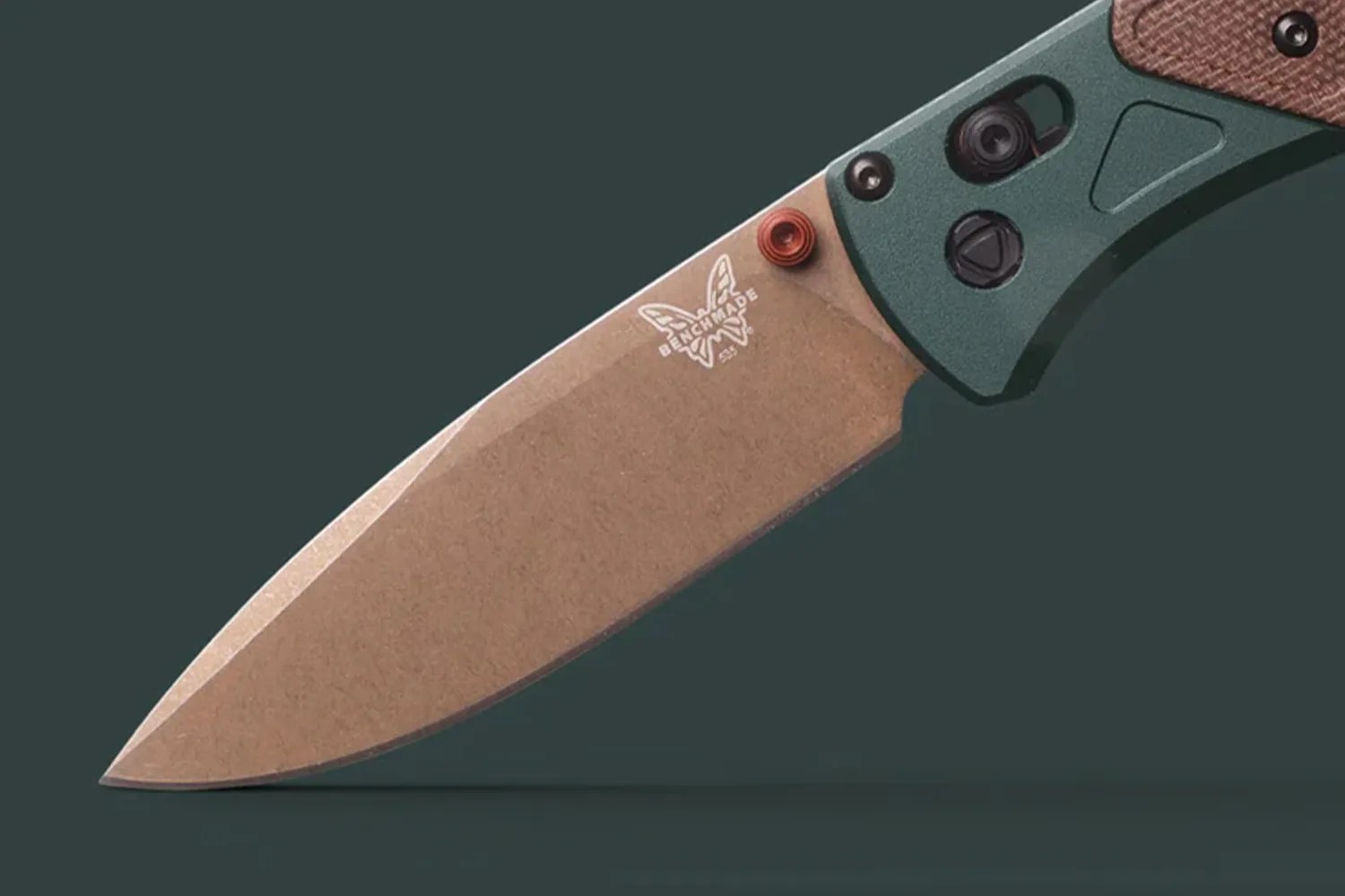 Benchmade folding knife with stonewashed blade and green handle with brown textured grip.