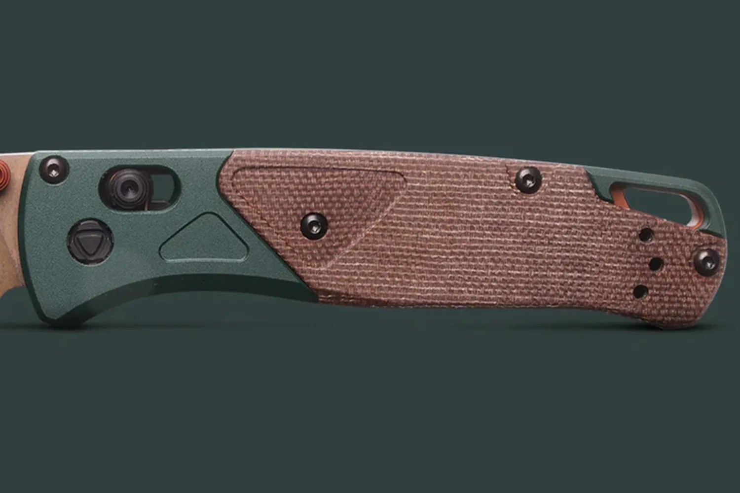 Folding knife handle with green metal and textured brown grip panels, featuring screws and a lanyard hole.