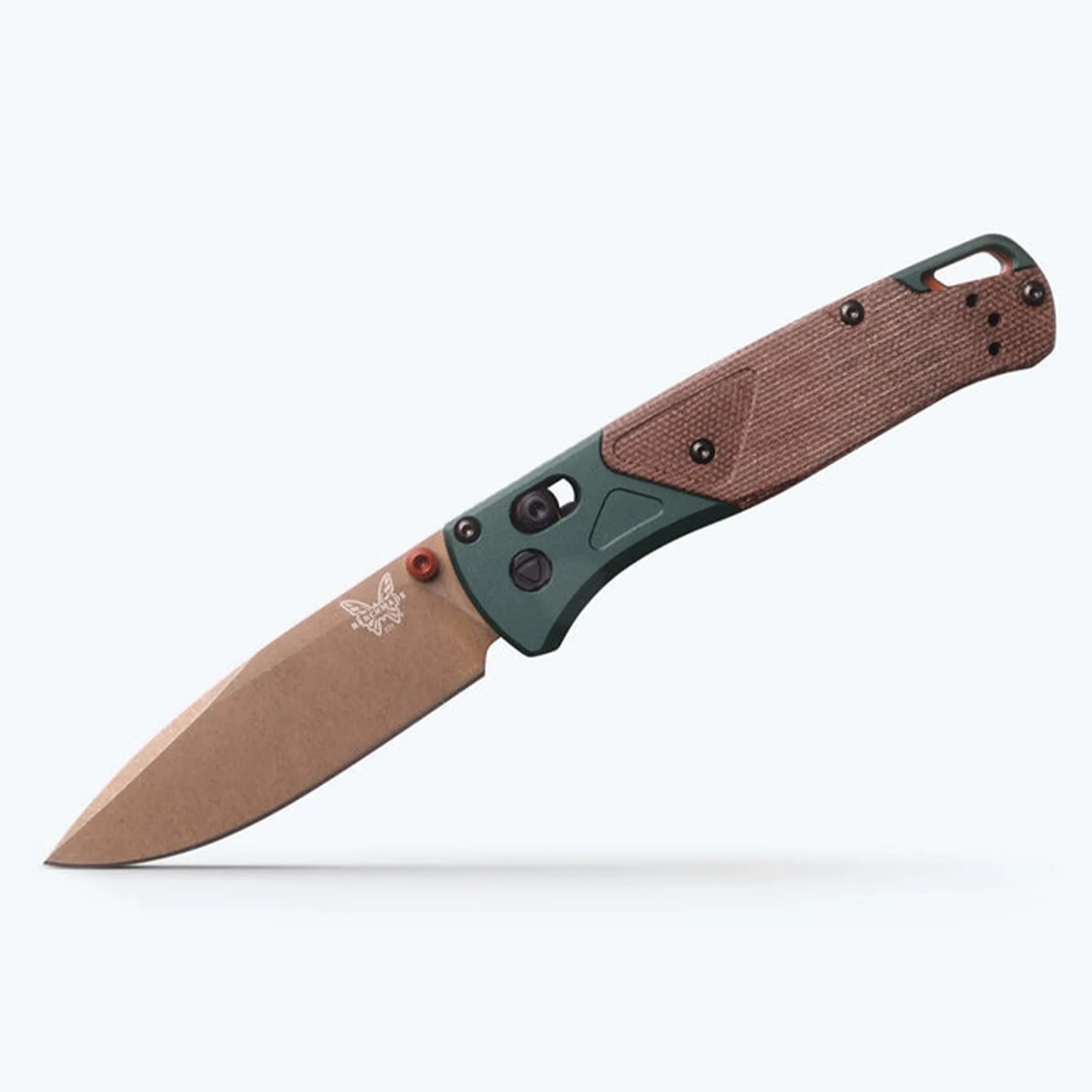 Folding knife with tan blade, green and brown textured handle, and butterfly logo near the blade base.