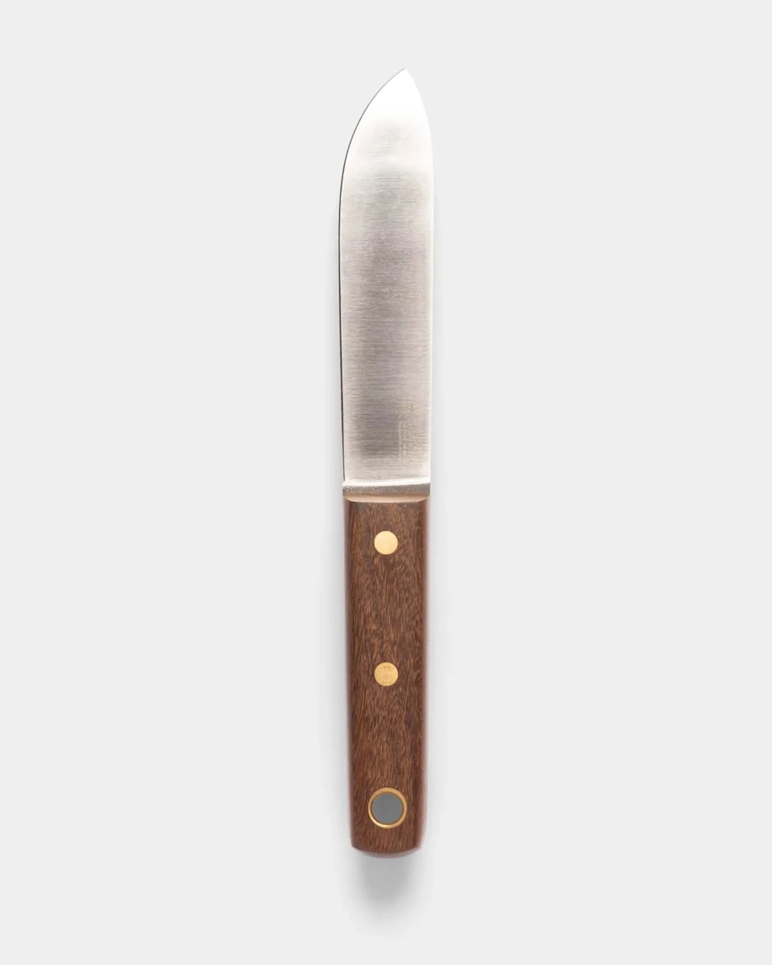 Knife with a stainless steel blade and a wooden handle featuring two brass rivets and a circular metal accent.