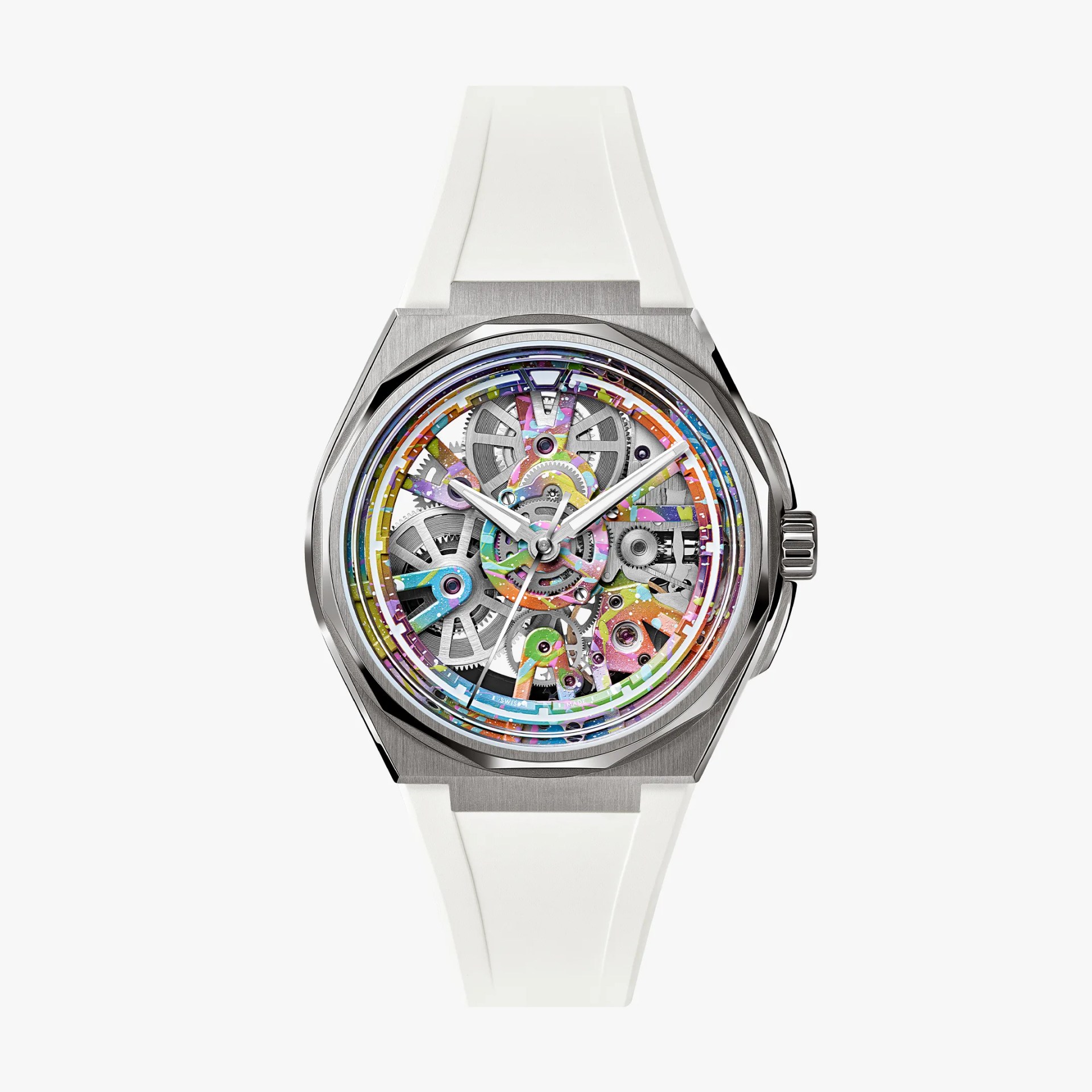 Silver watch with a colorful skeleton dial and white rubber strap.