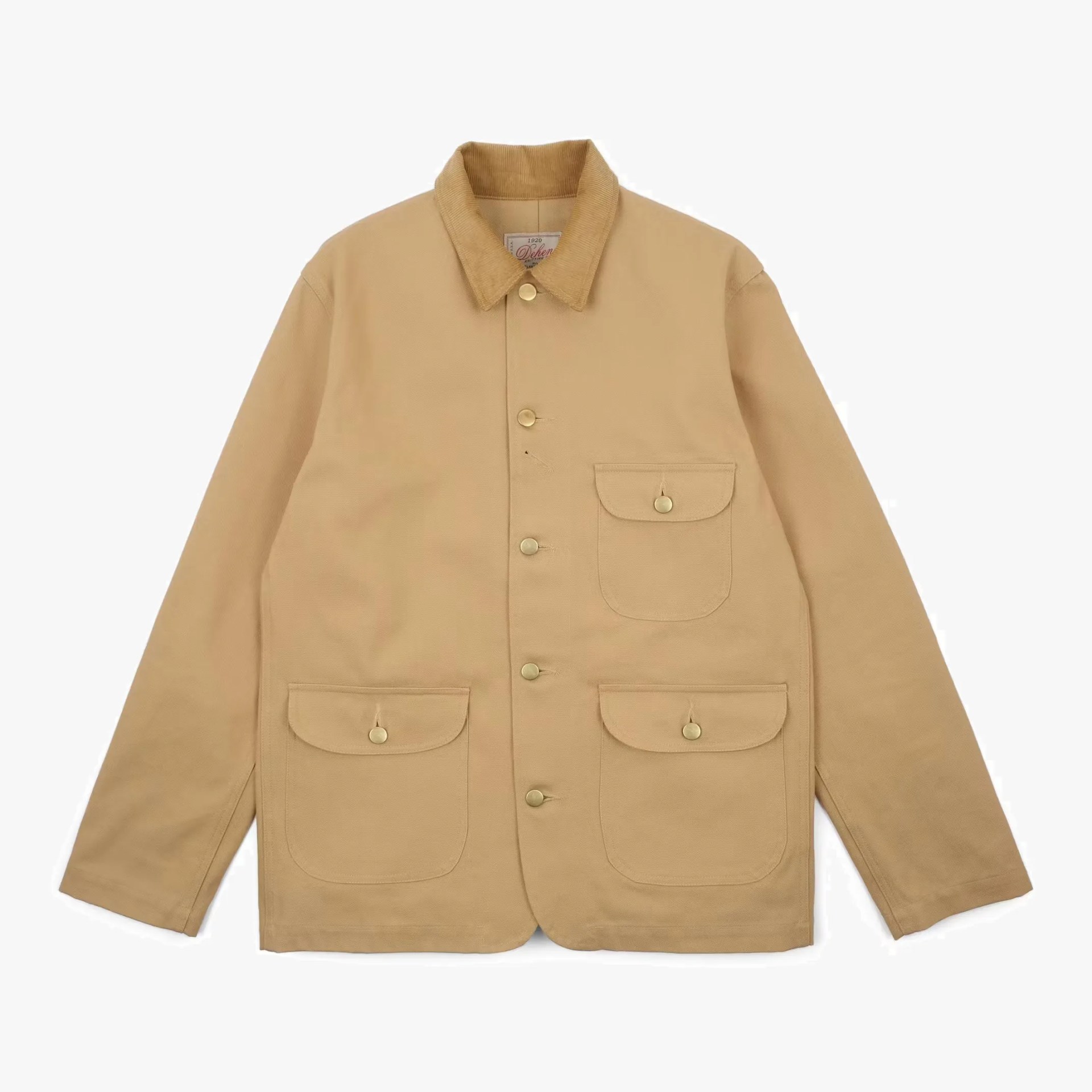 Tan canvas jacket with corduroy collar and four front flap pockets with snap buttons.