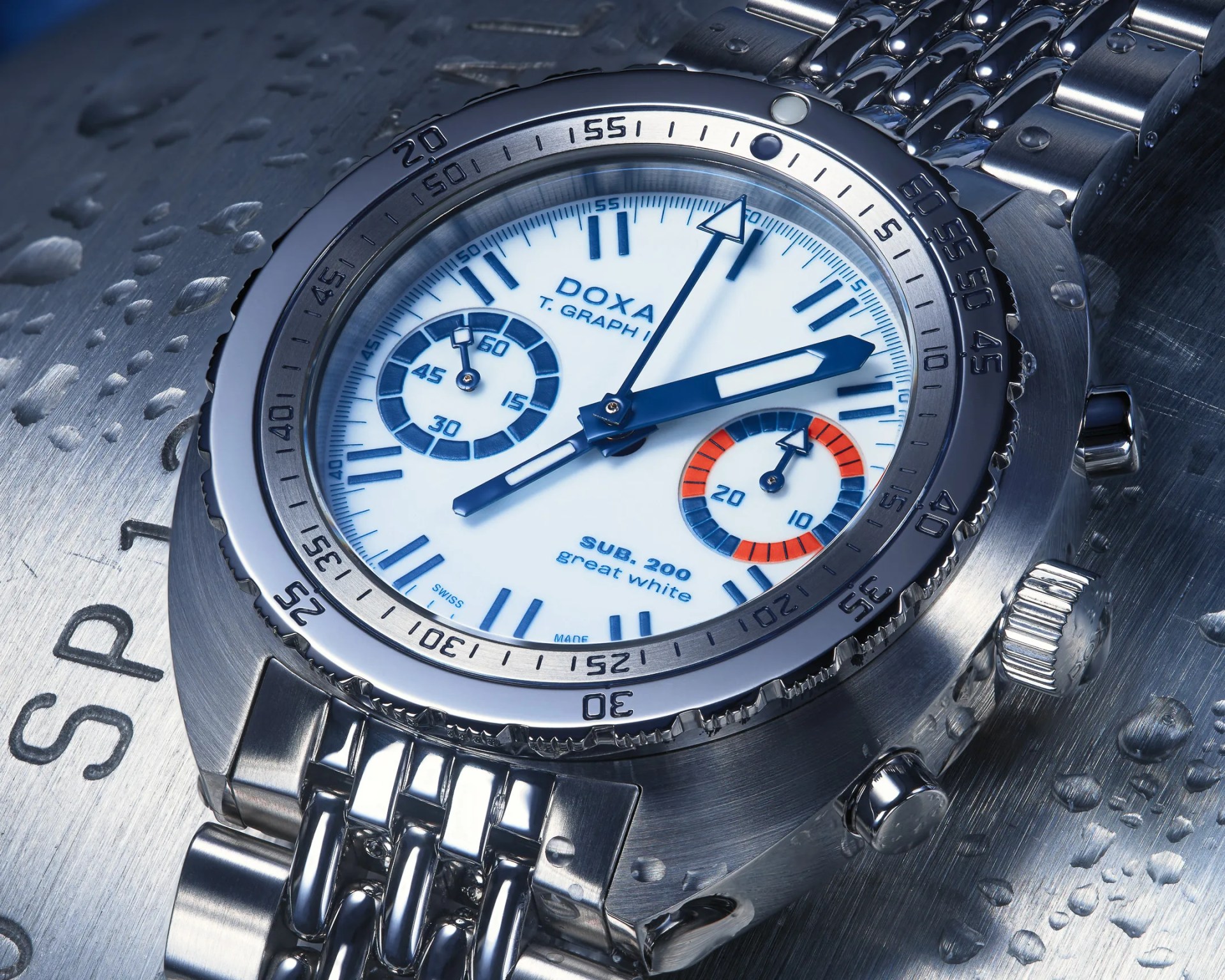 Close-up of a silver DOXA T. Graph Sub 200 Great White wristwatch with blue and orange details on a wet metal surface.