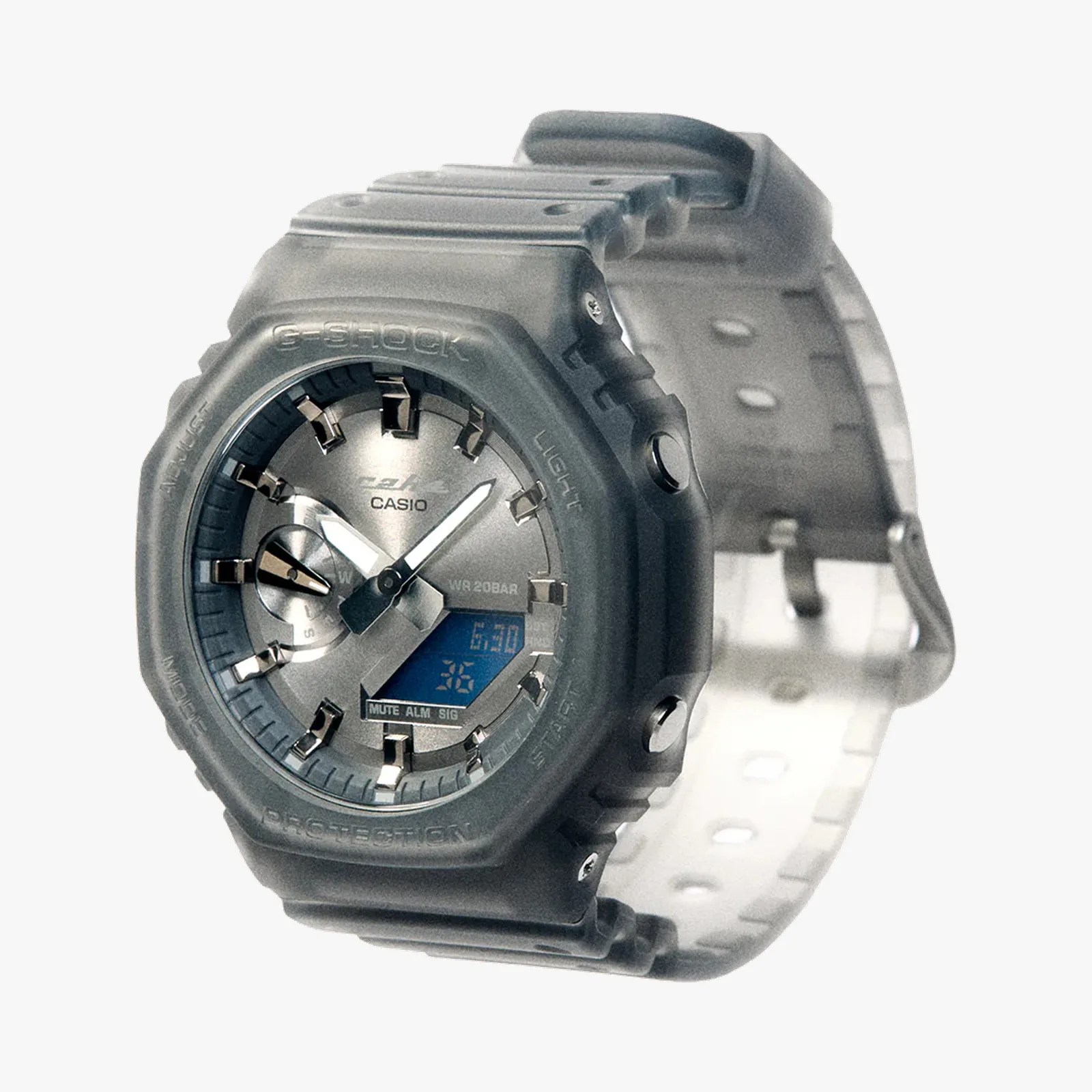 Translucent gray Casio G-Shock watch with analog-digital display and resin strap.