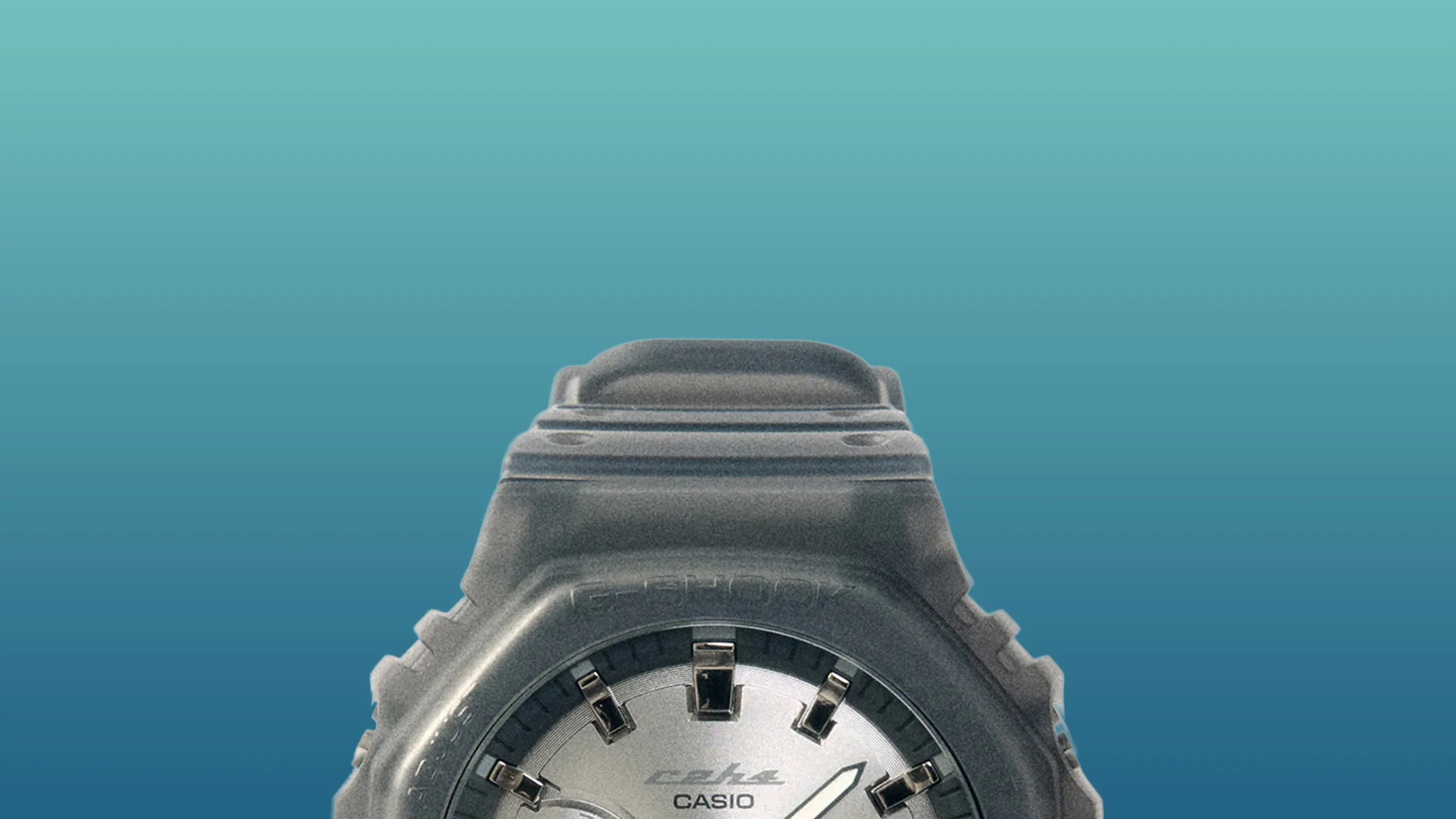 Black Casio G-Shock watch with silver dial and white hands against a blue gradient background.