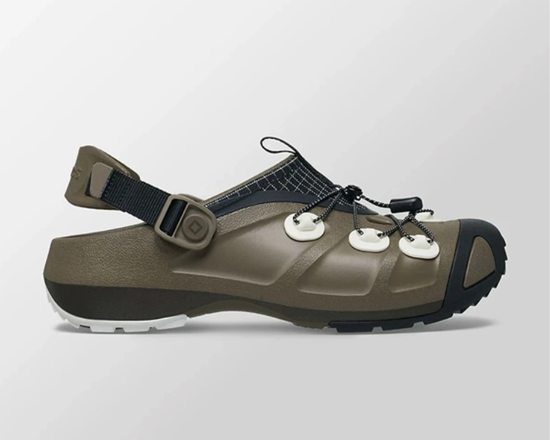 Olive green and black outdoor sandal with adjustable strap and bungee lacing system.