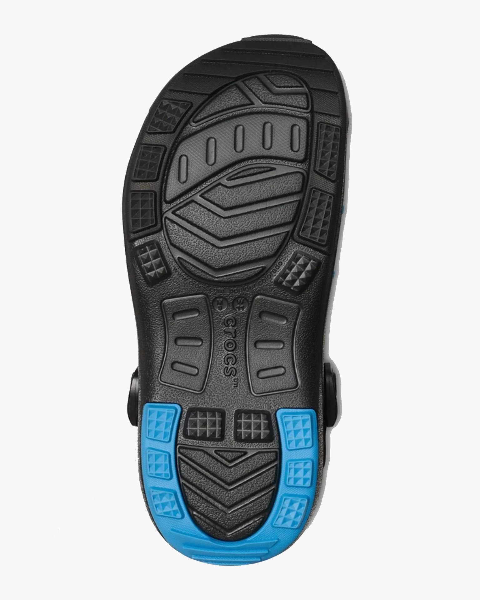 Black and blue rubber sole of a Crocs shoe with textured tread pattern.