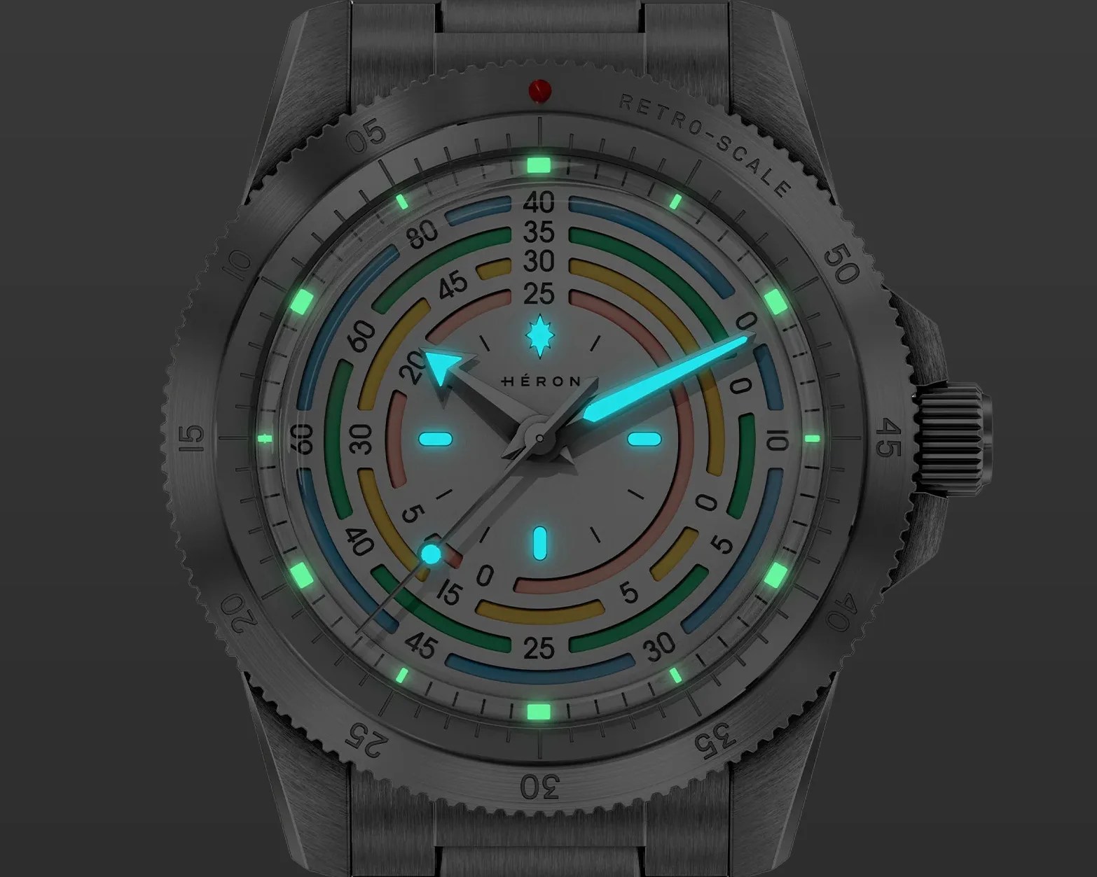 Black metal wristwatch with colorful segmented dial and glowing blue and green hands and markers.
