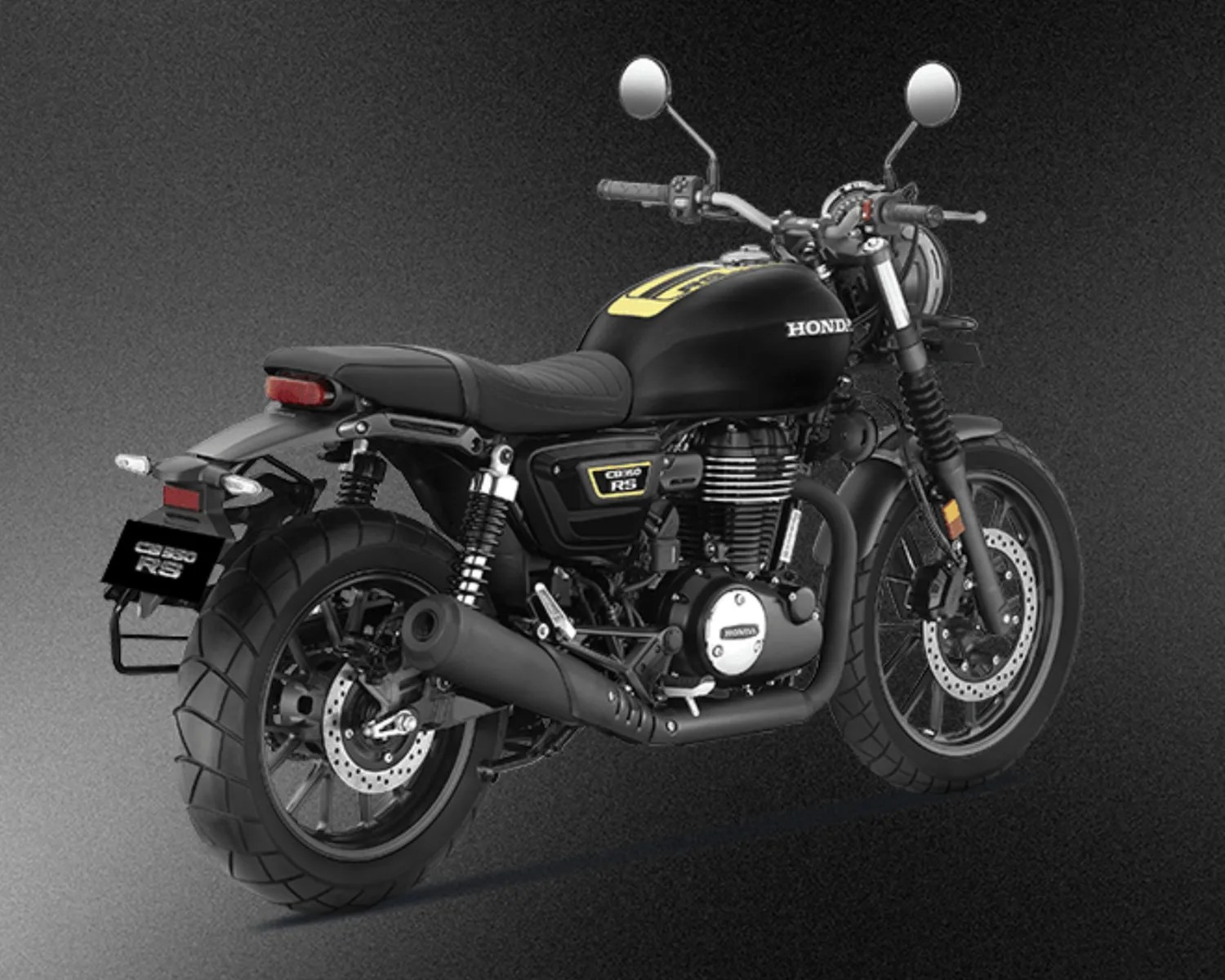 Matte black Honda motorcycle with yellow accents and dual rear shock absorbers on a dark gradient background.