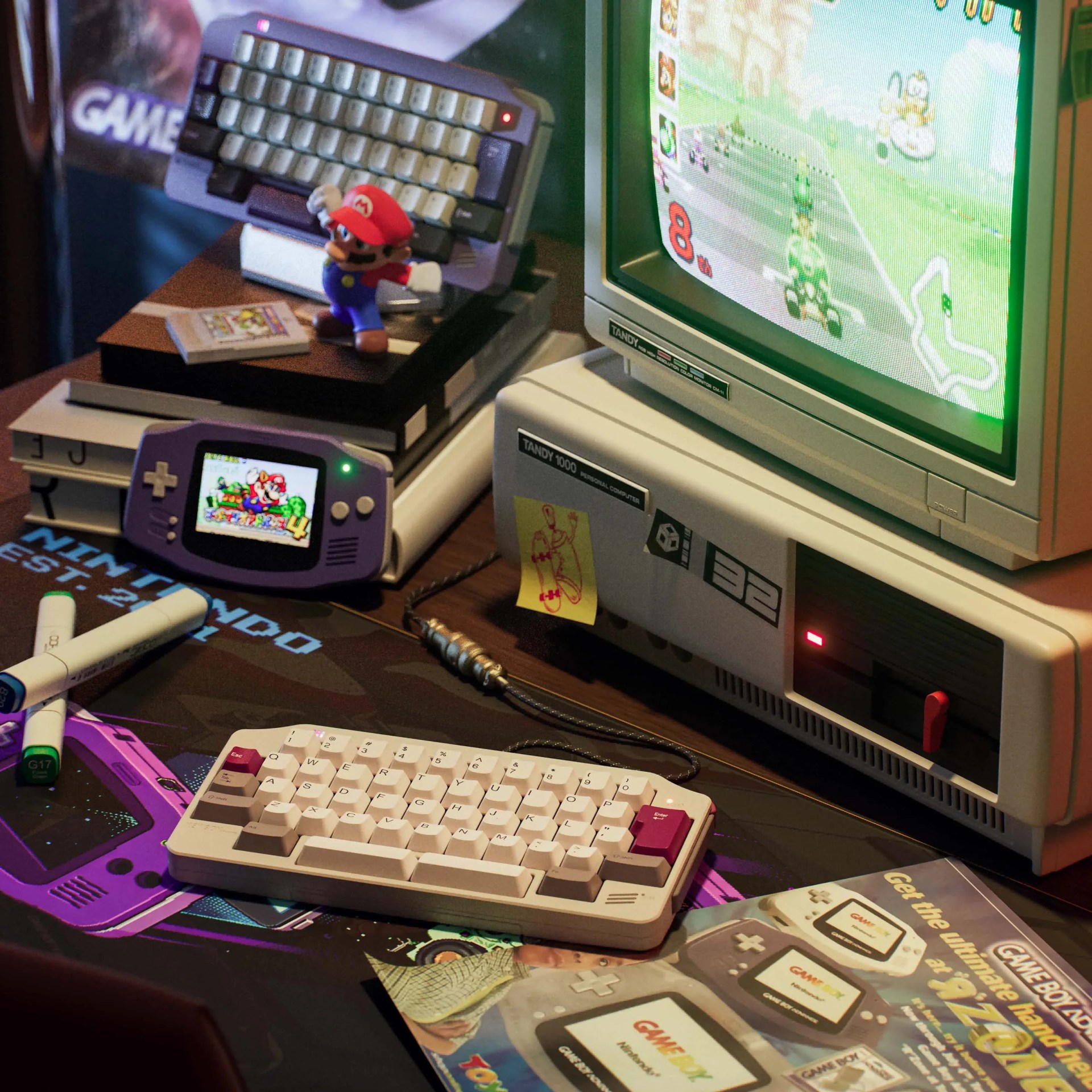 Beige mechanical keyboard with purple and white keycaps on a desk with retro gaming items including a purple Game Boy Advance and a Tandy 1000 computer.