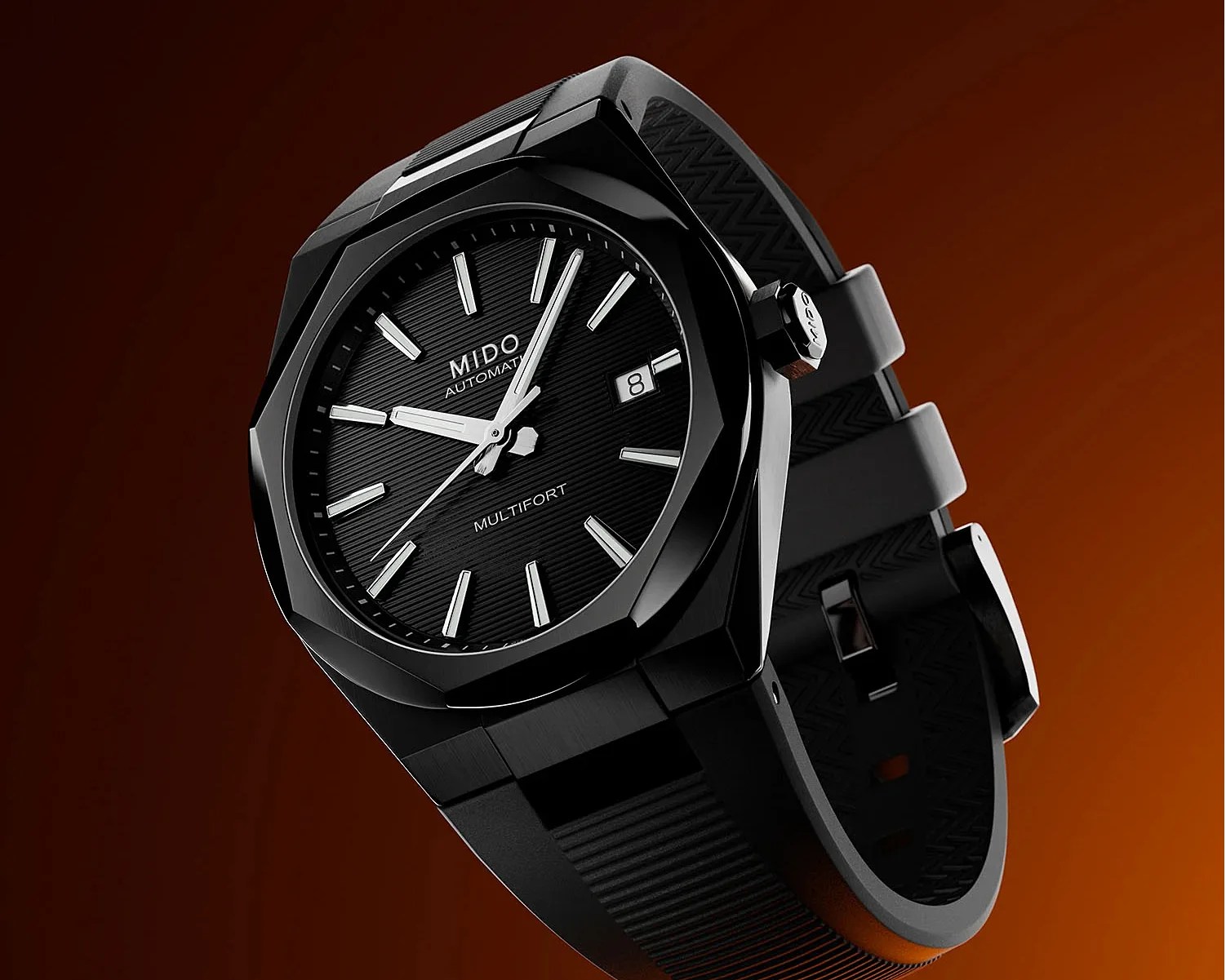 Black Mido Multifort automatic wristwatch with a textured dial and rubber strap on a brown background.