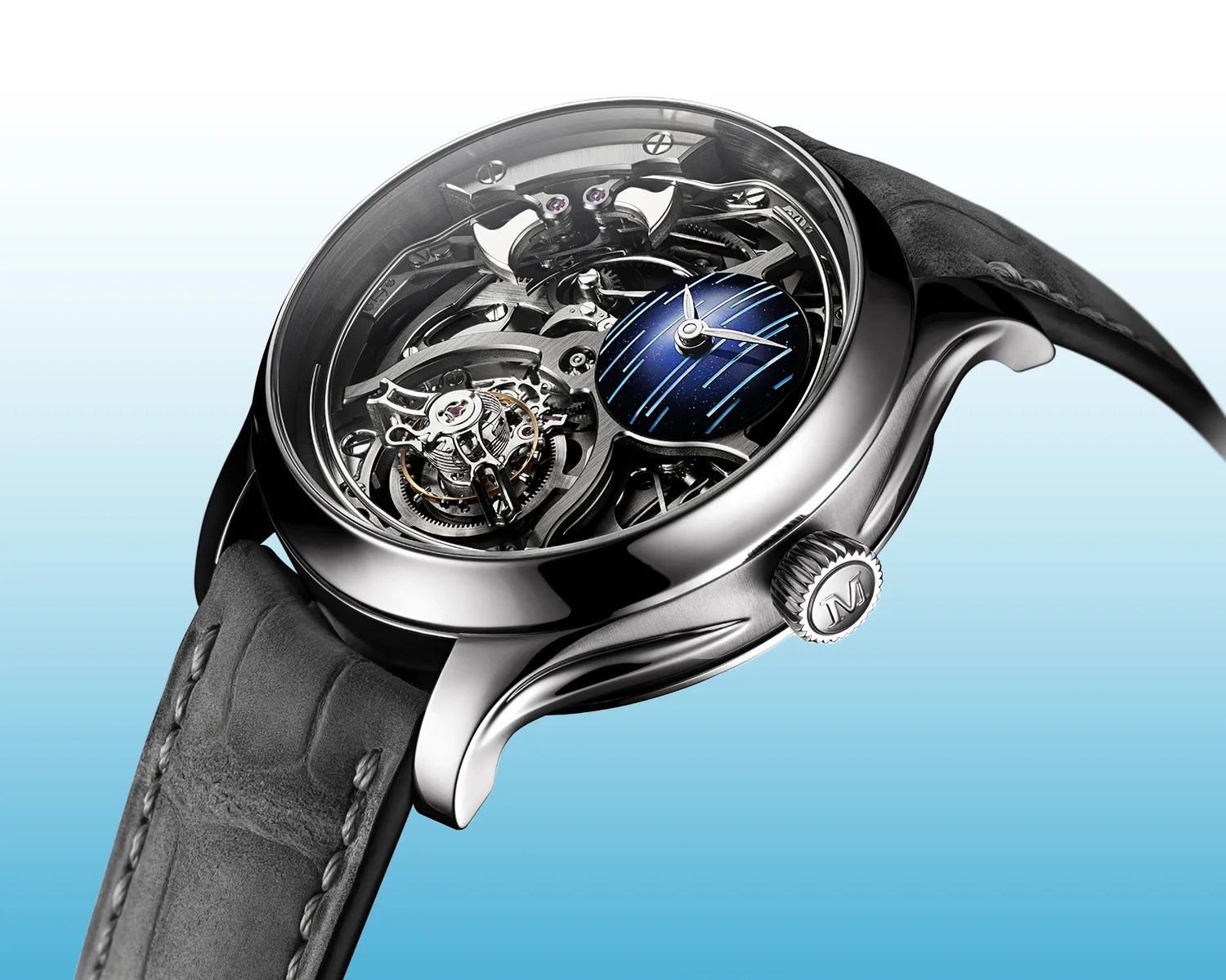 Silver mechanical wristwatch with exposed gears and a small blue dial with light blue stripes, on a gray leather strap.