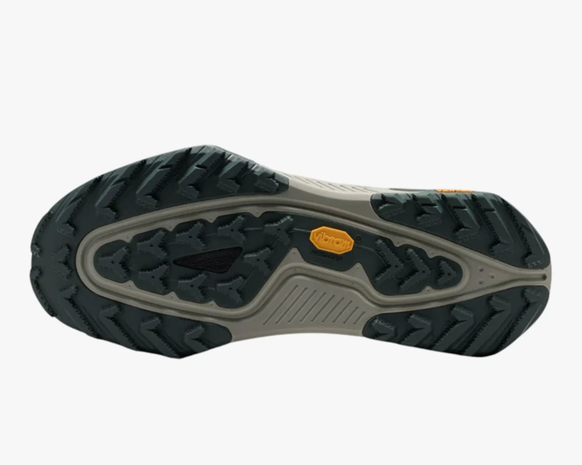 Black and gray Vibram rubber shoe sole with deep treads and a yellow Vibram logo.