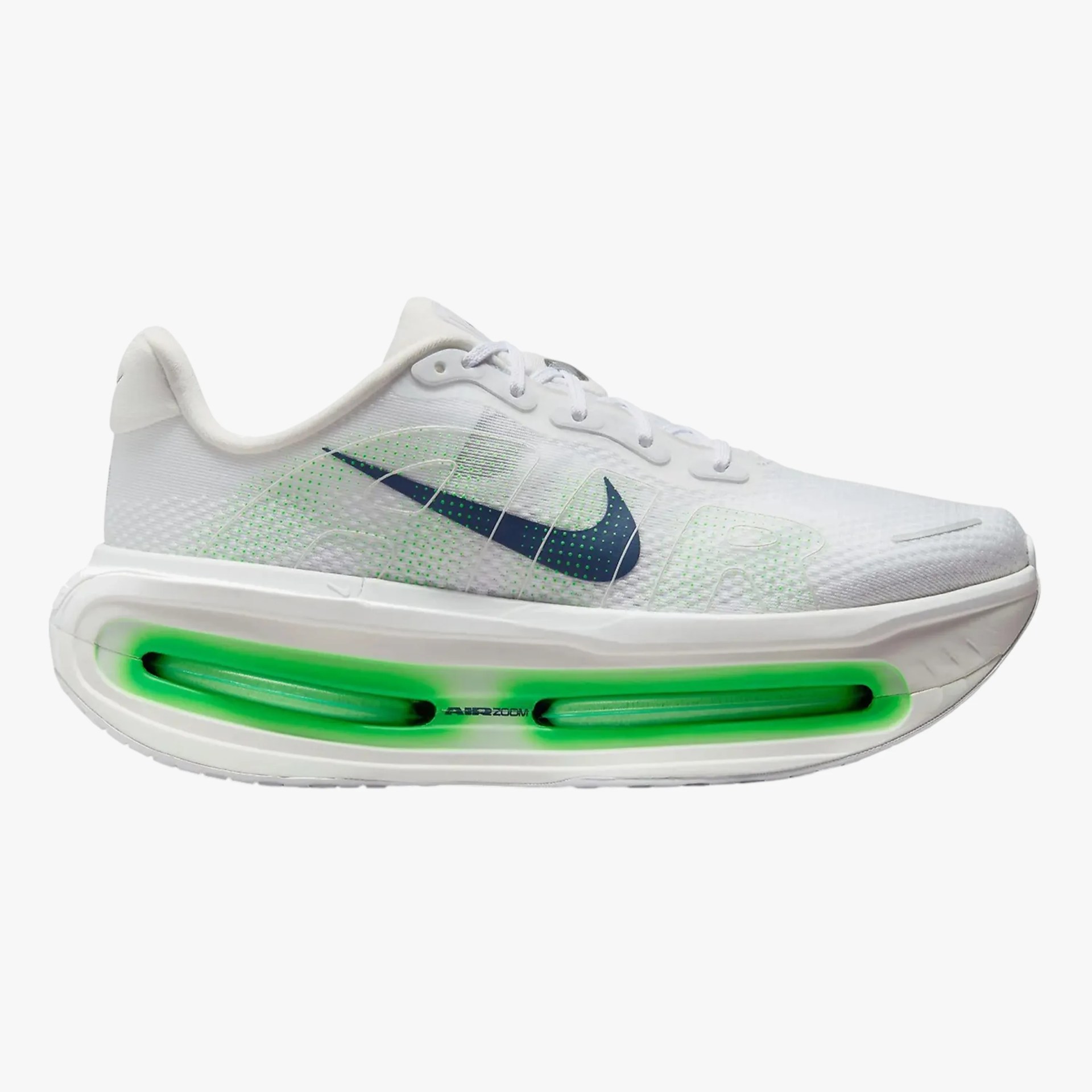 White Nike Air Zoom running shoe with navy blue swoosh and green air cushion in sole.