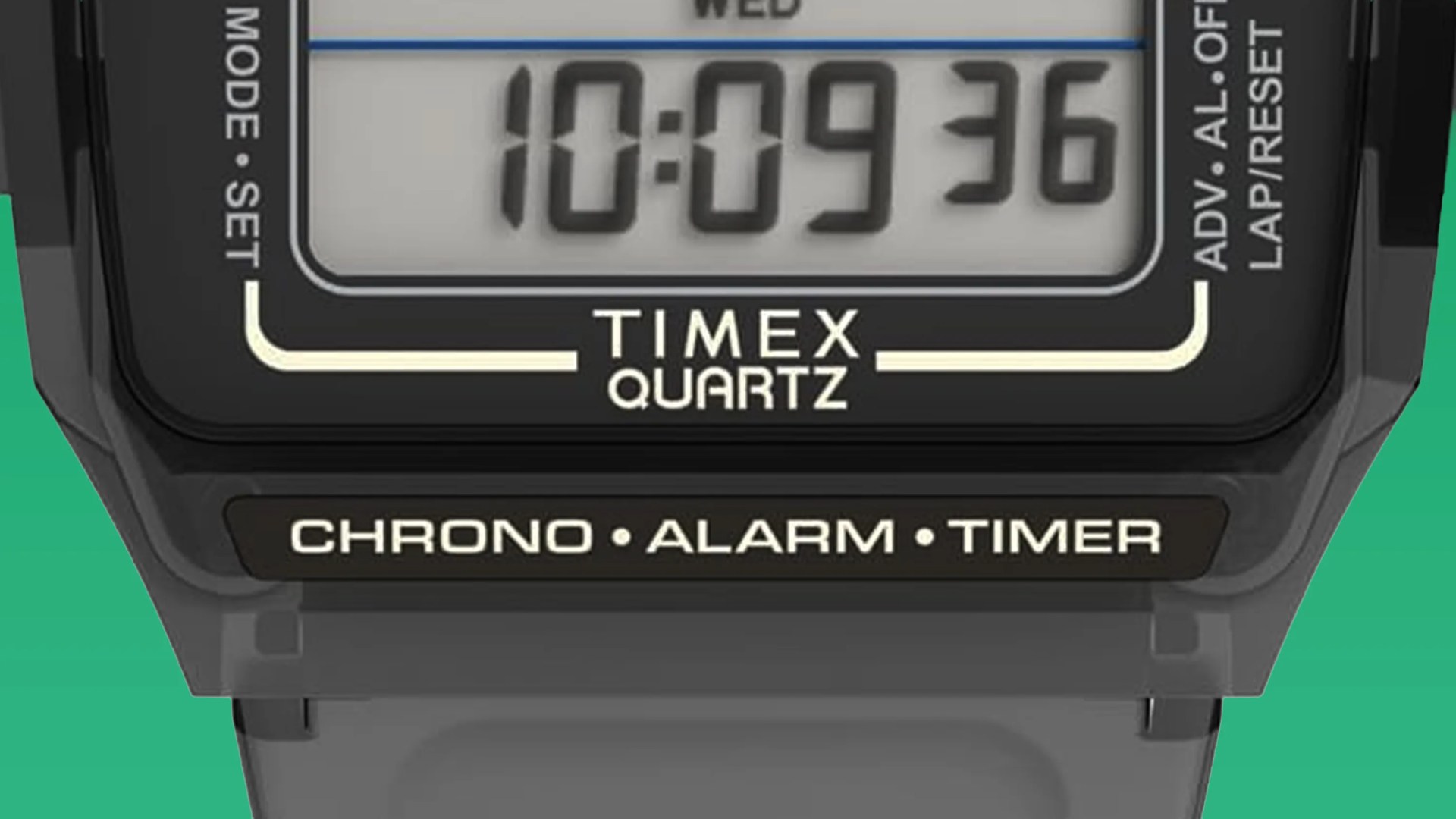 Close-up of a Timex Quartz digital watch face showing time 10:09:36 with chrono, alarm, and timer functions.