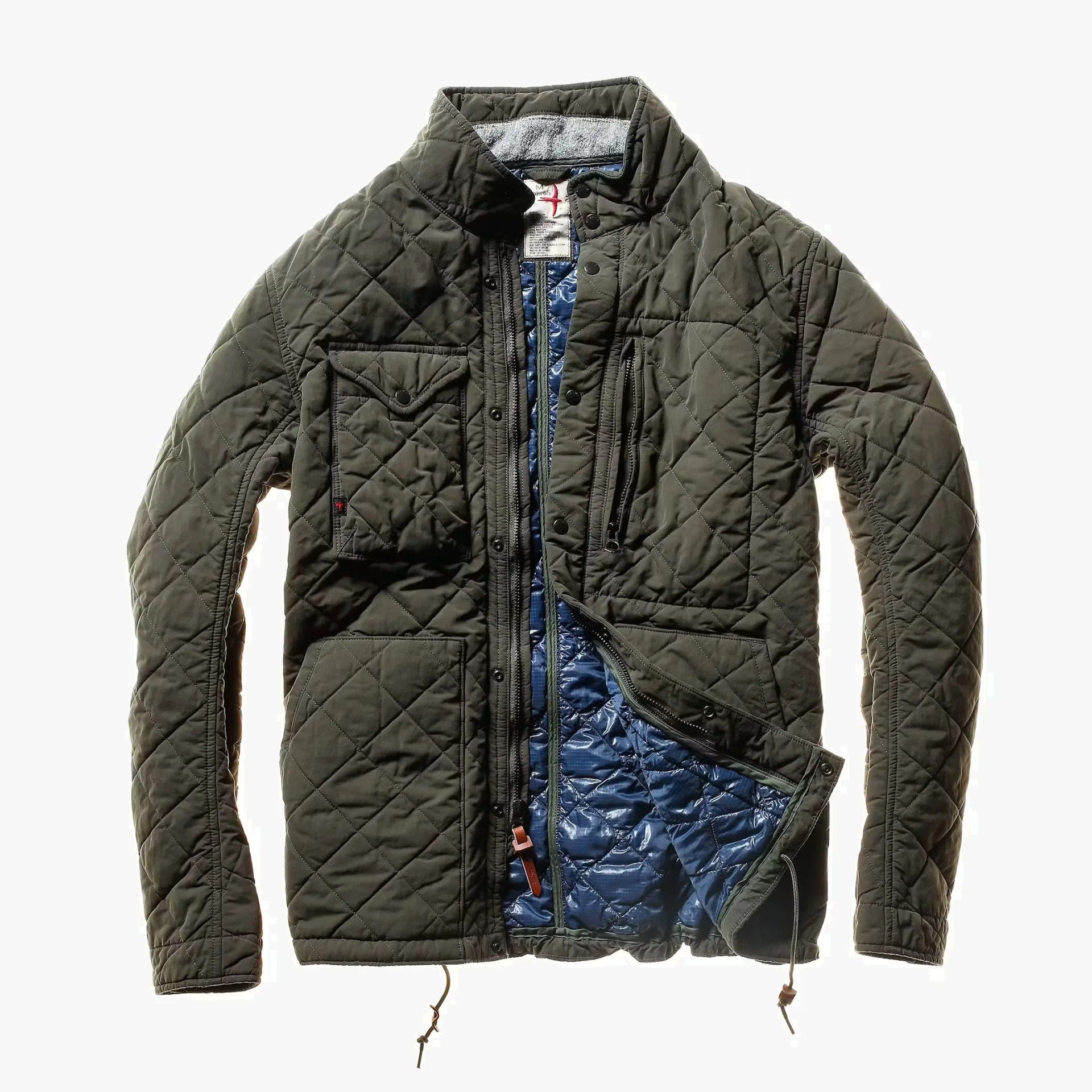 Olive-green quilted jacket with snap pockets and blue quilted inner lining partially unzipped.