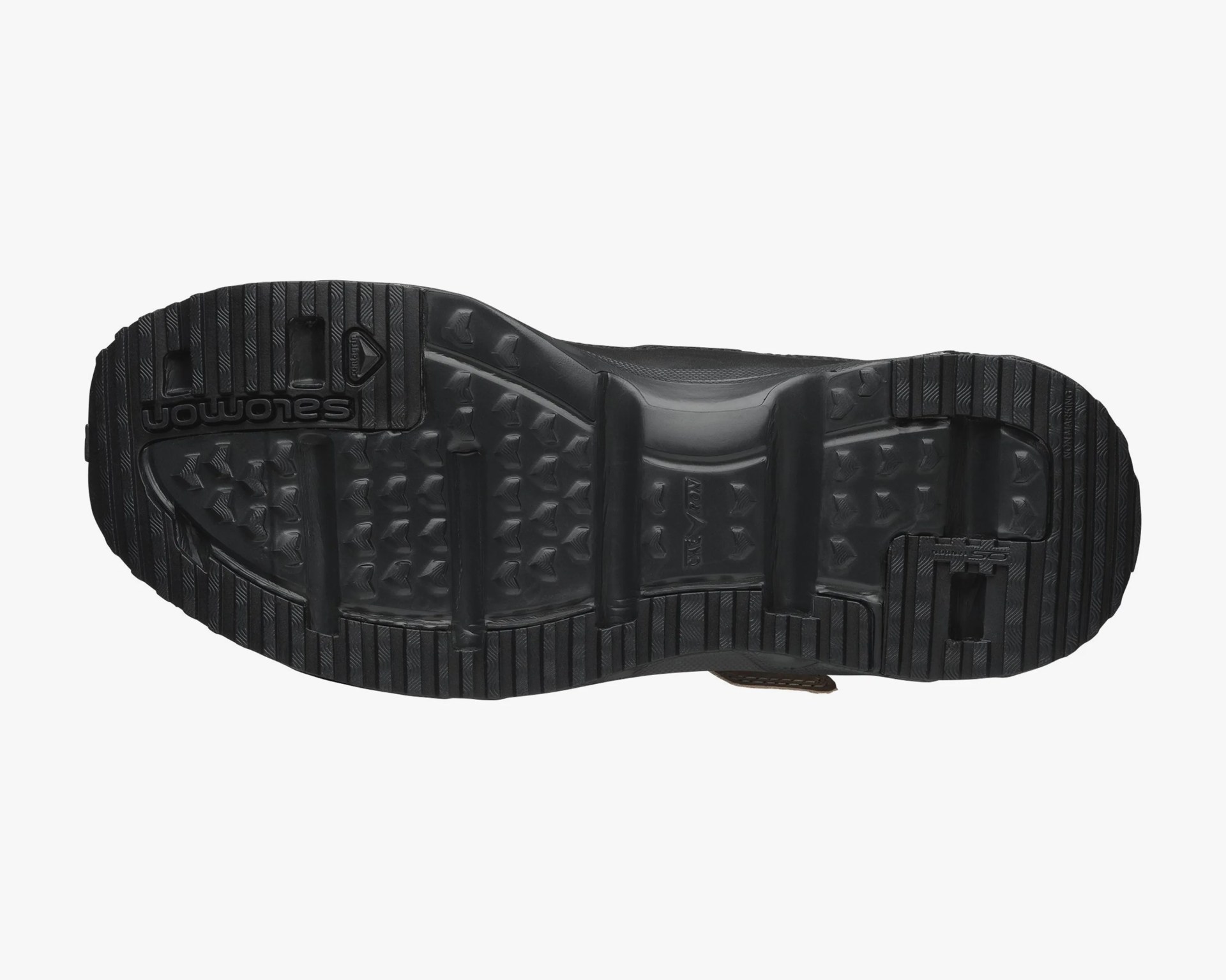 Black rubber shoe sole with deep treads and Salomon branding.