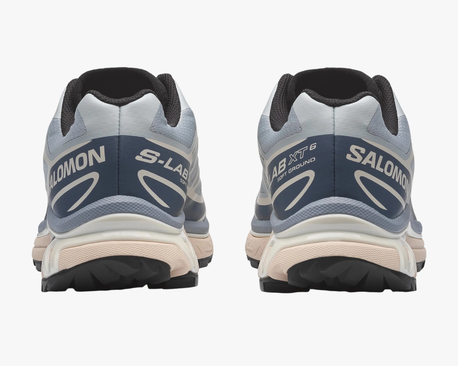 Pair of light blue and navy Salomon S-Lab XT-6 soft ground running shoes shown from the back.