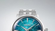 Silver Seiko wristwatch with a textured blue dial and silver hour markers and hands.