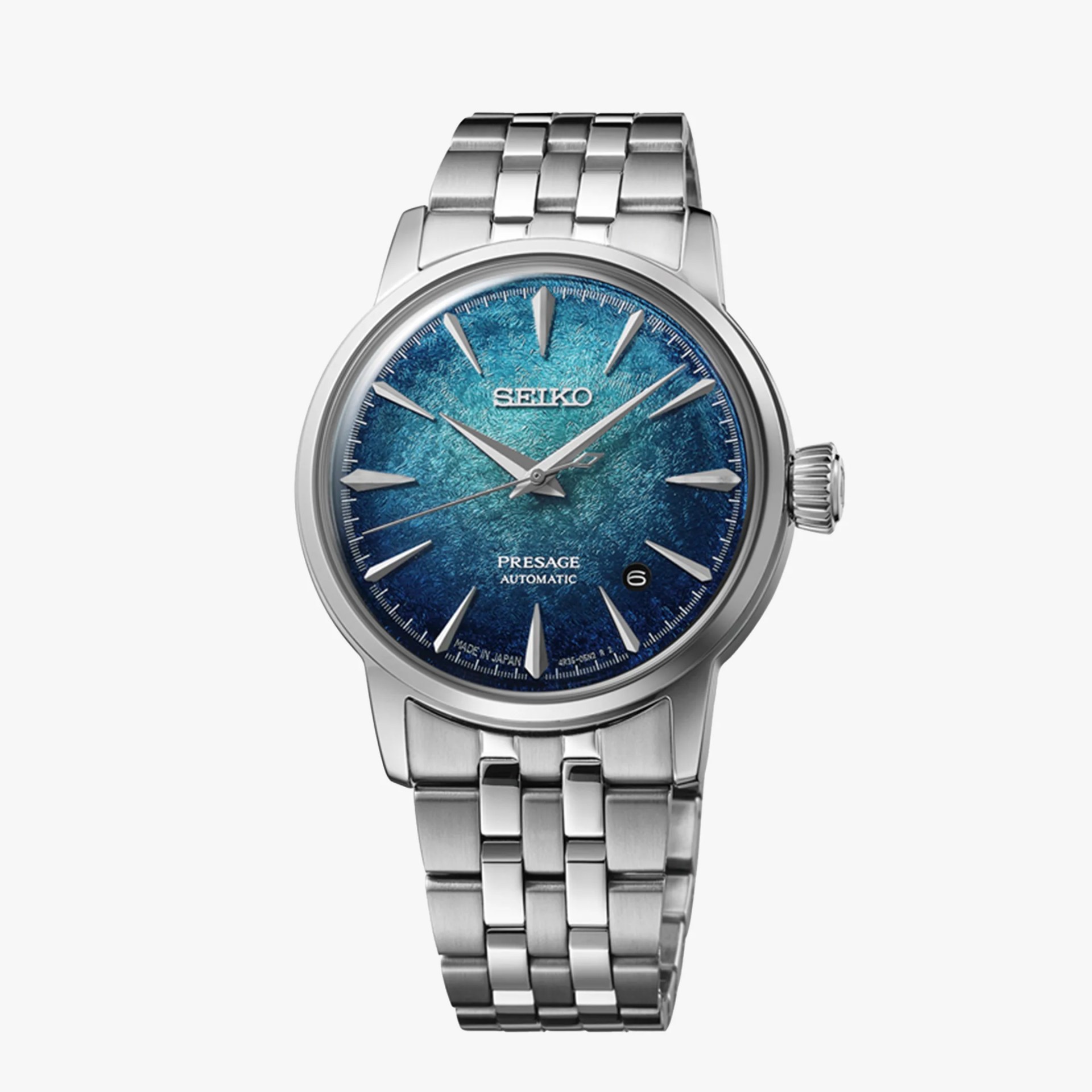 Silver stainless steel Seiko Presage automatic wristwatch with textured blue dial and date window at 4:30.