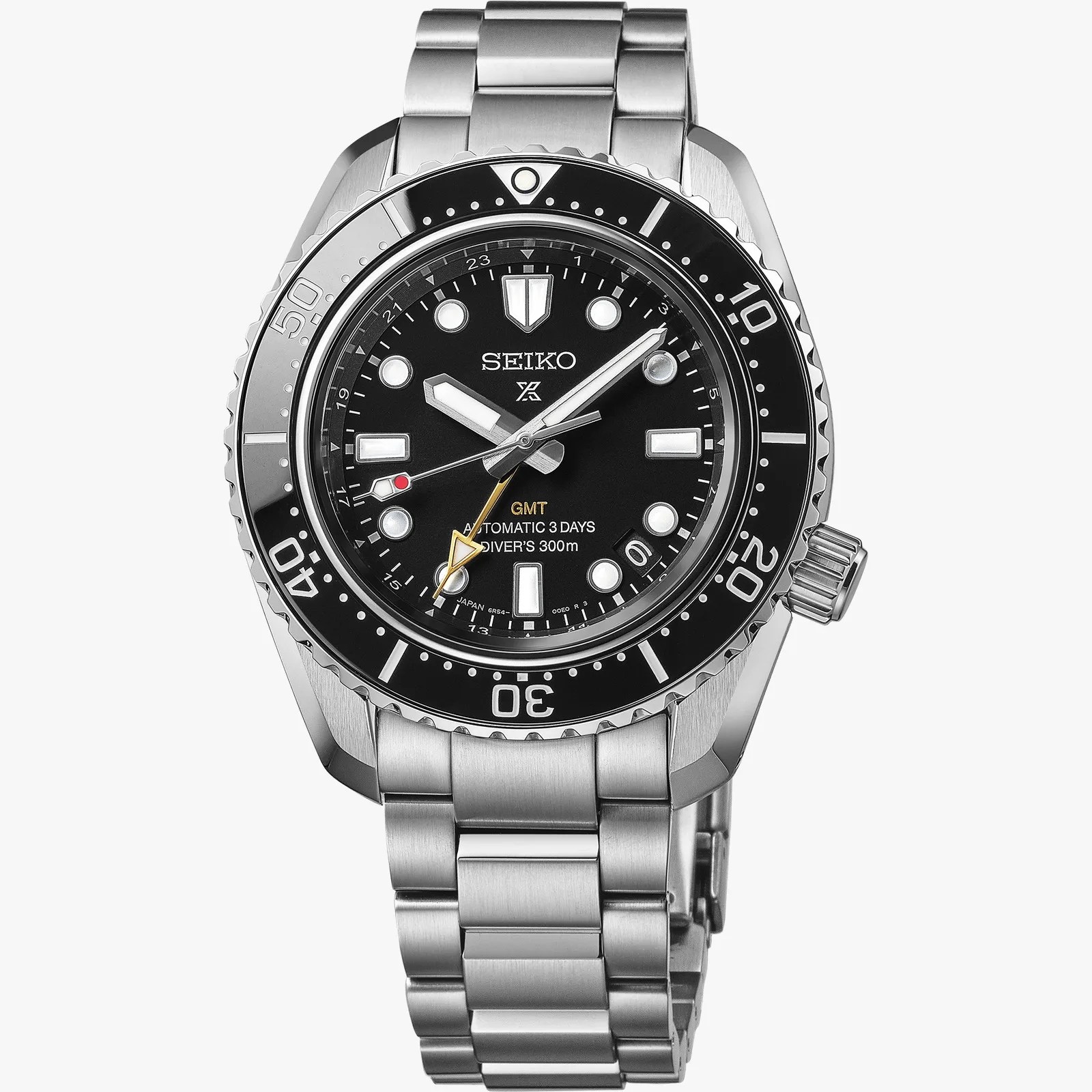 Stainless steel Seiko diver's watch with black dial, luminous markers, and GMT hand.