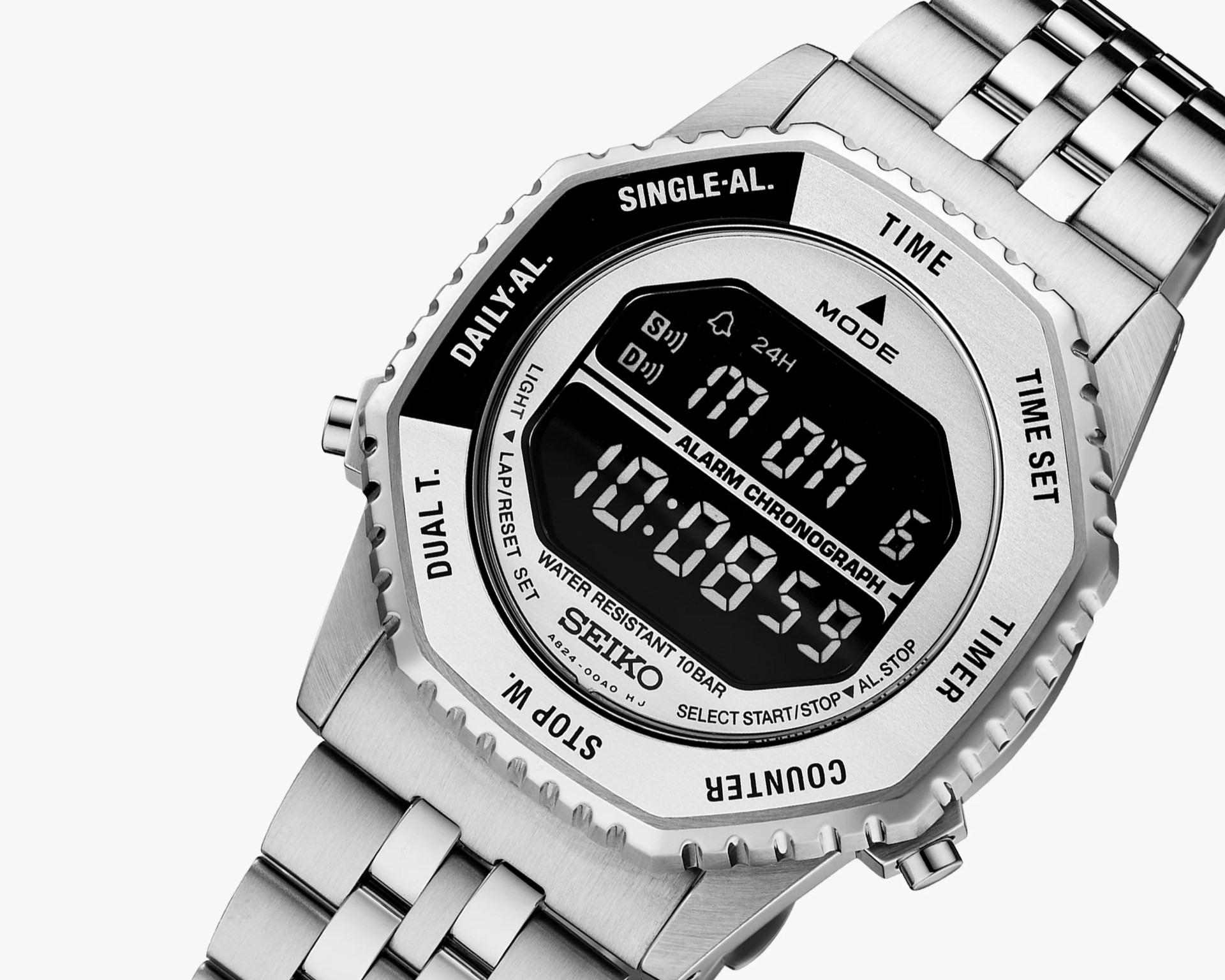 Silver Seiko digital wristwatch with stainless steel bracelet and octagonal bezel showing alarm and chronograph functions.