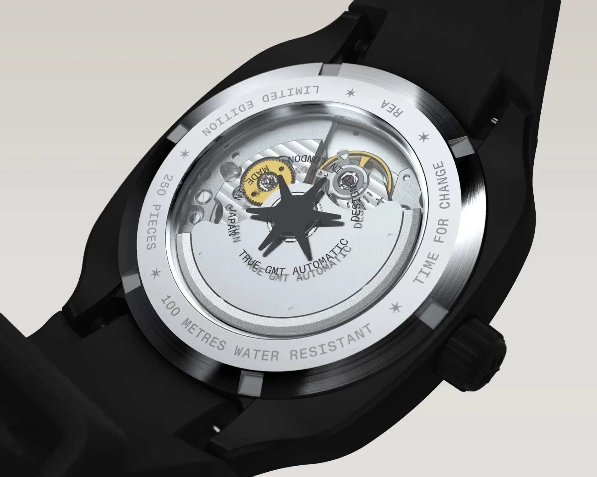 Close-up of a black wristwatch back showing the automatic movement with "LIMITED EDITION," "250 PIECES," and "100 METRES WATER RESISTANT" engraved on the silver rim.